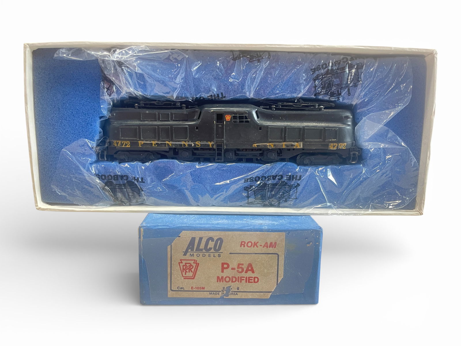 Alco Brass HO PRR P-5A Modified: HO Gauge. Nice 2-6-2 Electric, nicely custom painted, decals a bit sloppy & flaking, but has a can motor installed. It shows moderate run time with box and foam.Shipping: Weiss Auctions offers