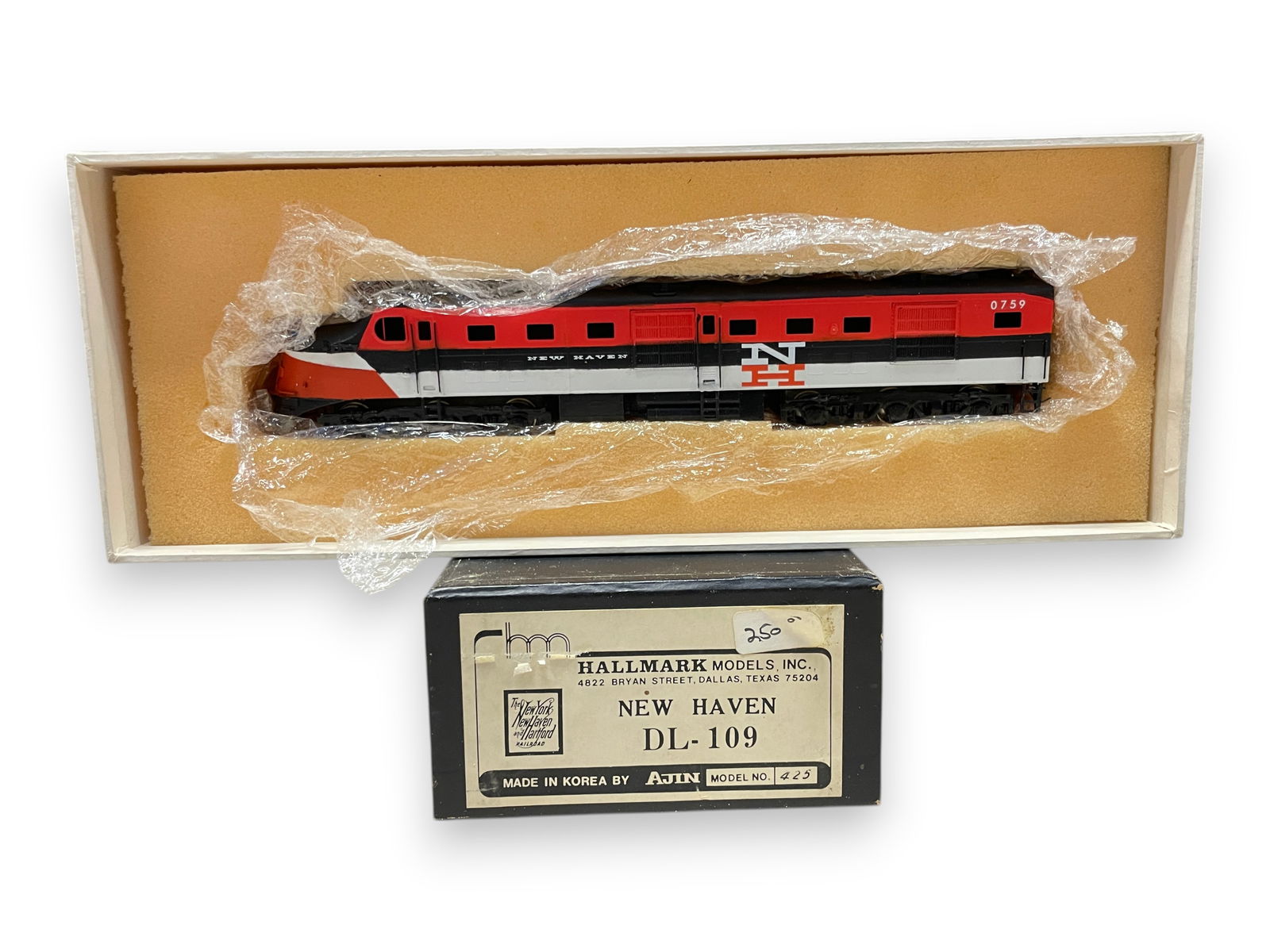 Hallmark Brass HO NH DL109 Diesel: HO Gauge. Custom Painted diesel #0759. Has can motor and shows light play wear with box & foam. Shipping: Weiss Auctions offers full-service, in-house shipping for nearly all items in this auction. Fo