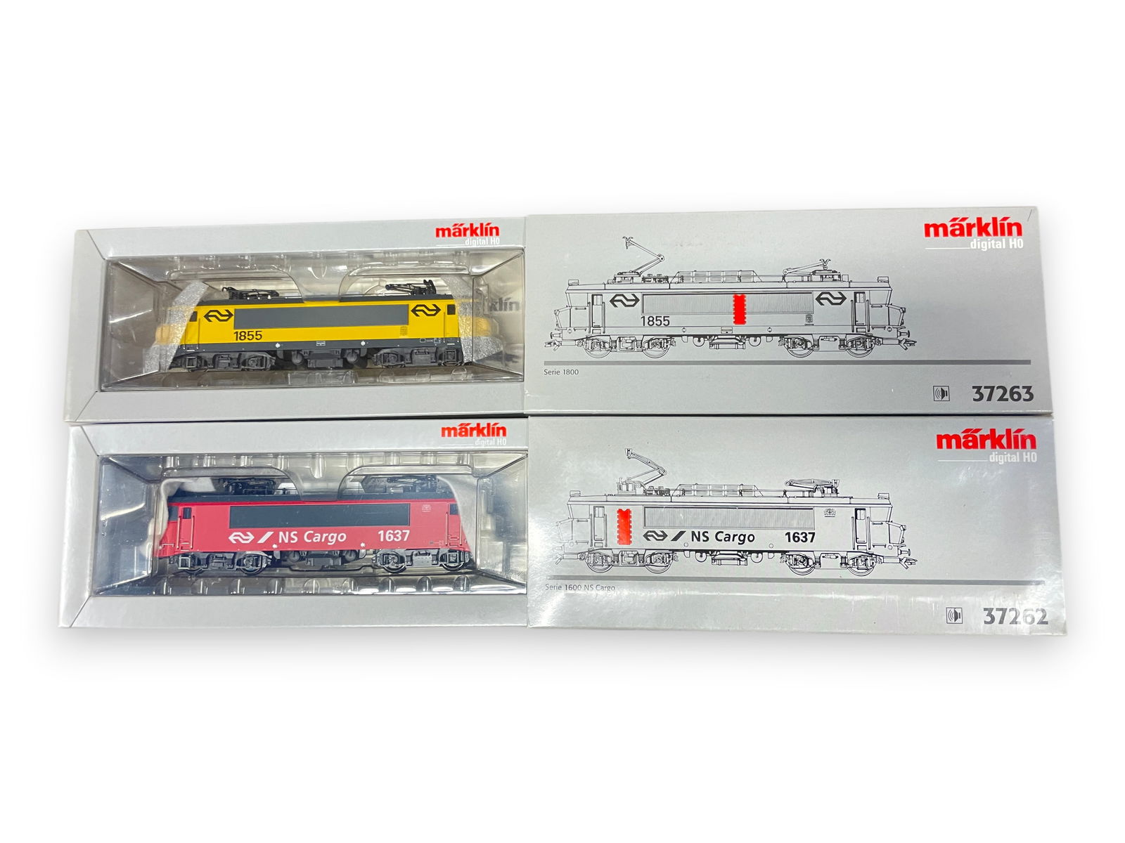 2 Marklin Swedish Electrics with Sound: HO Gauge. Includes 37263 Serie 1800; 37262 Serie 1600 NS Cargo. Both appear new in boxes.Shipping: Weiss Auctions offers full-service, in-house shipping for nearly all items in this auction. For a