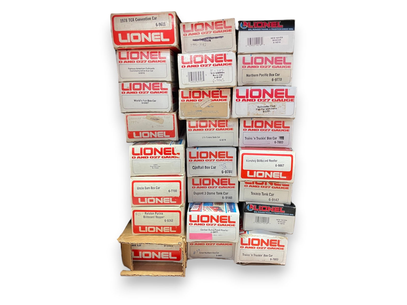 24 Lionel MPC Freight Cars: Includes 9605; 9401; 2-7803, 1 ob worn; 2-19218; 9877; 9262; 7700, 9148, 9147, 9867, 9785, 7524, 7806, 9278 Lifesavers Tank;, 7801; 0781, TCA Museum Boxcar; 9467, 9418; 9443 over-written ob; 9770;