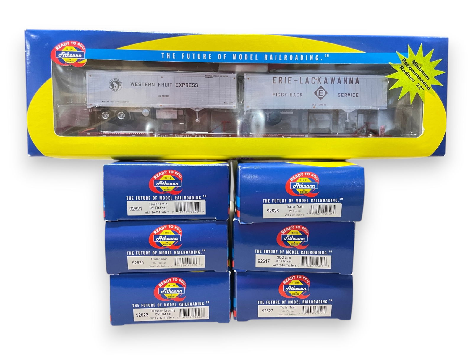 7 Athearn RTR 85ft Trailer Flats: HO Gauge, 22" Radius. Includes 92623, 92625, 92621, 92619, 92627, 92617, 92626. All are new in boxes. Shipping: Weiss Auctions offers full-service, in-house shipping for nearly all items in this aucti