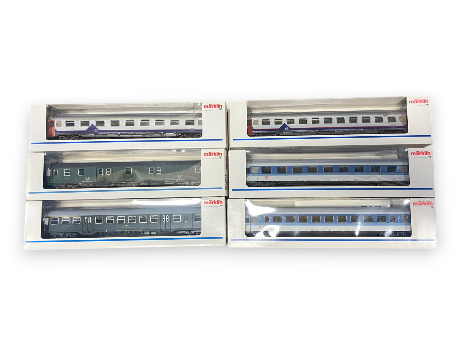 18 STORE-STOCK Marklin Passenger Cars: HO Gauge. Three each of - 4126, 4157, 4327, 4348, 4351 & 4352. All appear new in nice boxes. Shipping: Weiss Auctions offers full-service, in-house shipping for nearly all items in this auction. For a
