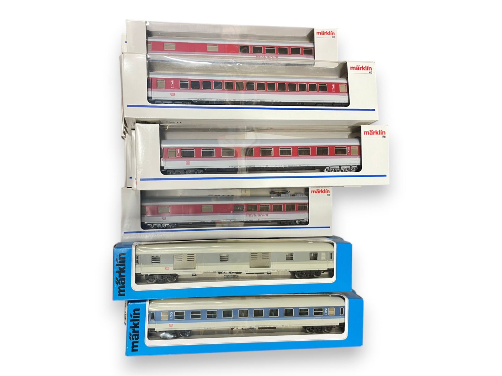 20 Marklin DB Express Cars: HO Gauge. Includes 4-4282, 4-4283, 2-4284, 4-4285, 4-4286; 2-4287. All appear new in boxes. Shipping: Weiss Auctions offers full-service, in-house shipping for nearly all items in this auction. For a