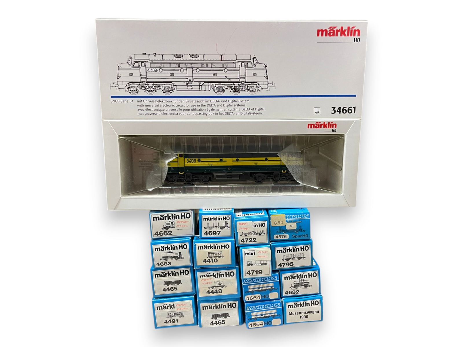 17pc Marklin Danish Goods Train: HO Gauge. Includes a 34661 SNCB Serie 54 Diesel; Wagons- 4662, 4683, 2-4465, 4491, 4448, 4410, 4967, 2-4664, 4719, 4722, 4576, 4795, 4682 & 1990 Museum Car. All appear like new with boxes, loco