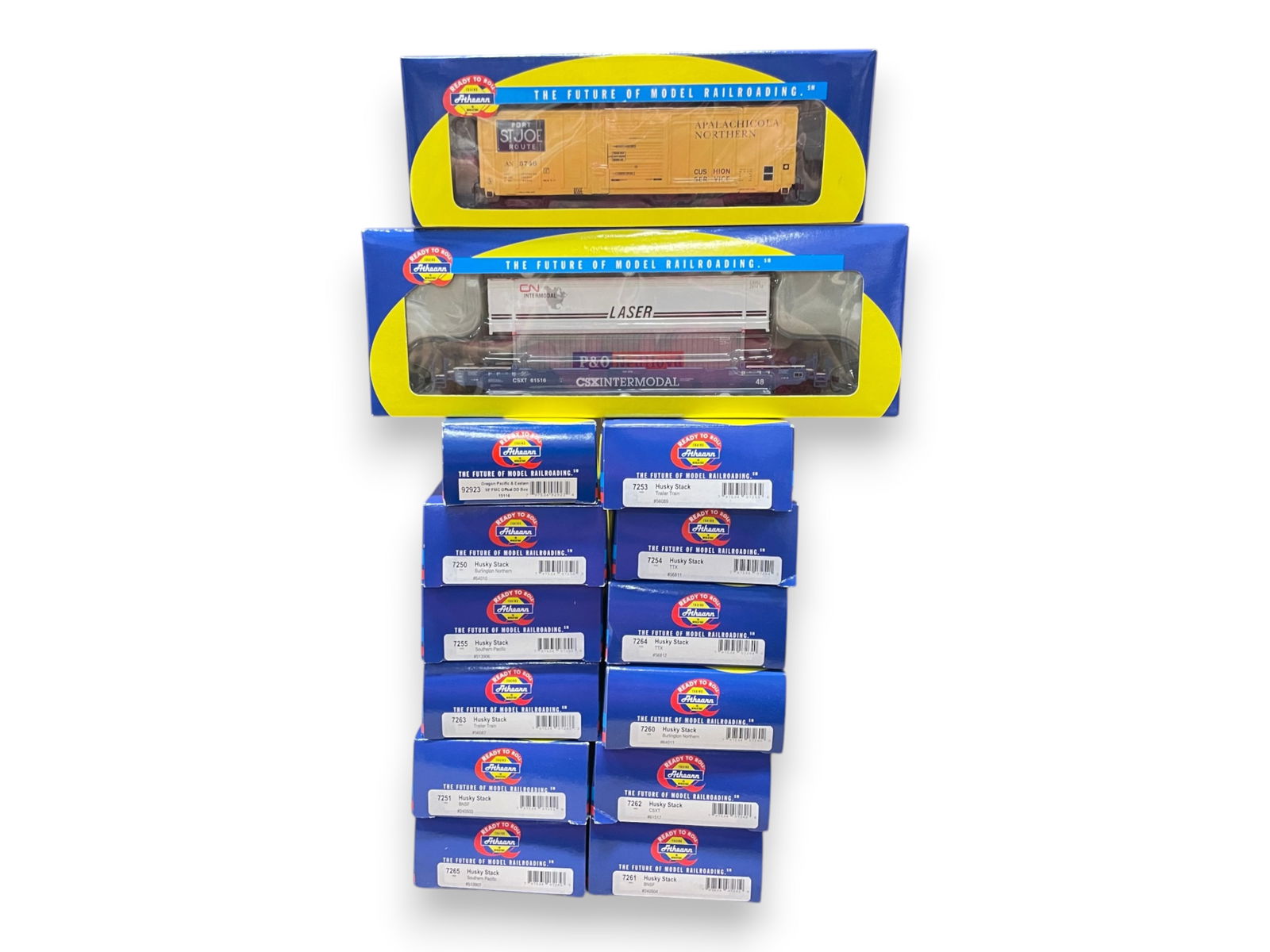 14 Athearn RTR Husky Stacks, Plus: HO Gauge. Includes Husky Stacks- 7250 through 7265, plus 2 boxcars. All appear new in boxes and are equipped with Kayde style couplers. Shipping: Weiss Auctions offers full-service, in-house shipping