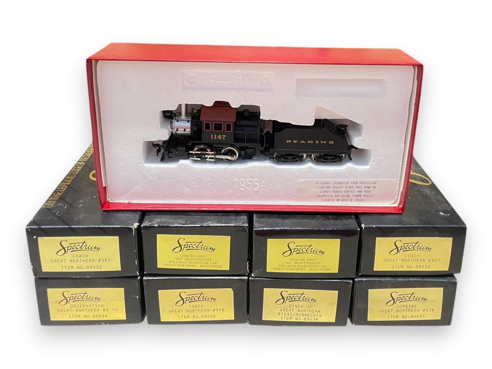 10pc Mantua & Bachmann HO Lot: Includes a Mantua Reading 0-4-0 Goat steam switcher; Bachmann DeWitt Clinton 5pc Train set in stained box; 8 Spectrum GN Heavyweights, all like new in boxes.Shipping: Weiss Auctions offers