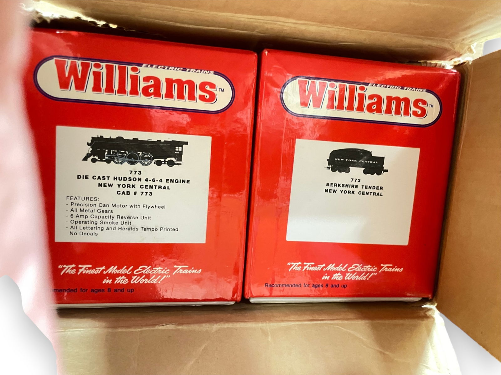 Williams 773 Hudson Steam Locomotive: Includes a 773 Hudson with flywheel drive, light and smoke. Original tender with horn & bell, has been redone in Lionel Lines lettering, that has 10% flaked off. Shows light run time with boxes and