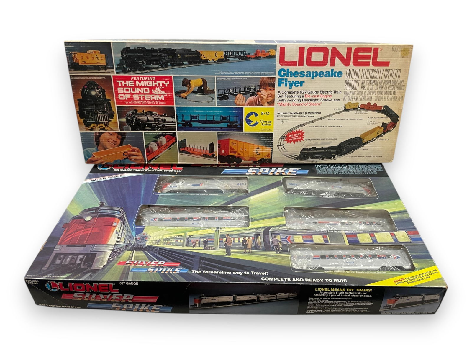 2 Lionel MPC Starter Sets: Includes 1586 Chessie Flyer steam set; 11707 Silver Spike Amtrak Set. Both appear complete, showing light use with shop worn set boxes. Shipping: Weiss Auctions offers full-service, in-house shipping