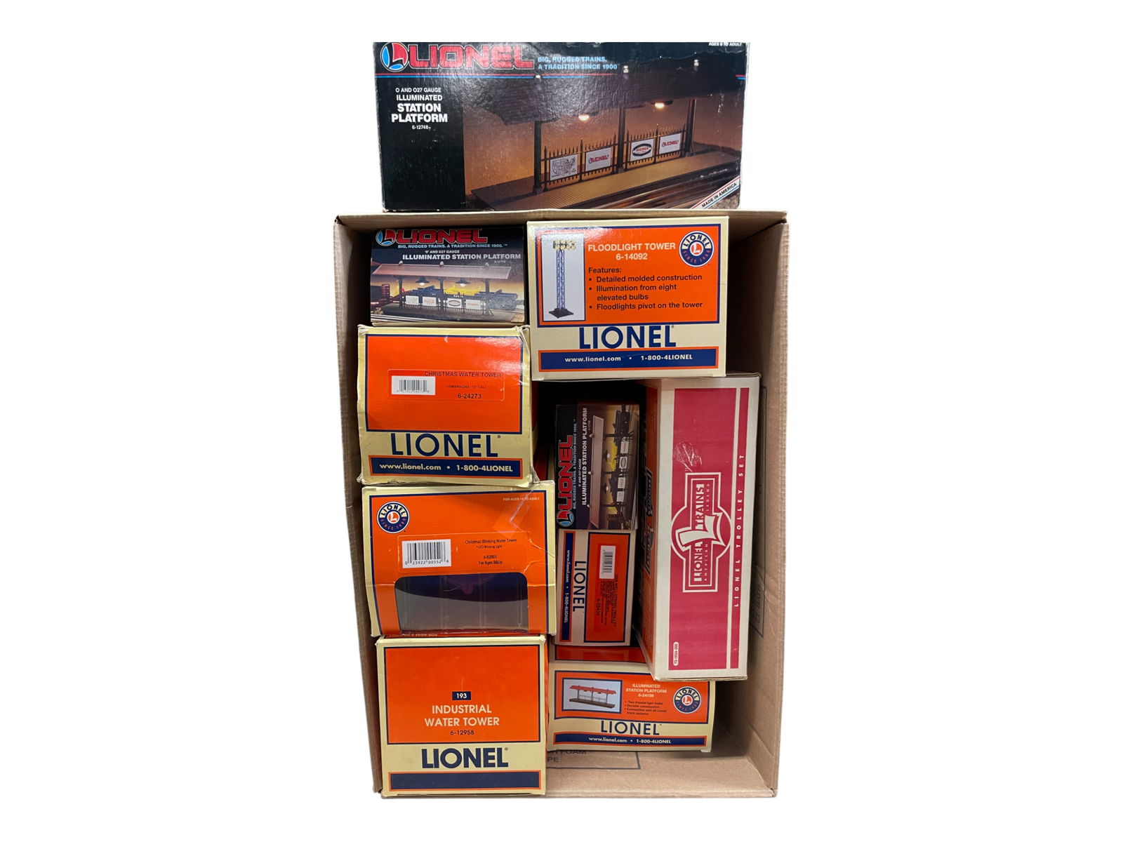 10pc Lionel Accessory & Trolleys Lot: Includes a 28430- Wellspring Trolley; 11850 Trolley Set; 12958; 82003; 24273; 3-12748; 24159, 14092. Several show light use, all with boxes, 3 worn. Shipping: Weiss Auctions offers full-service, in-ho