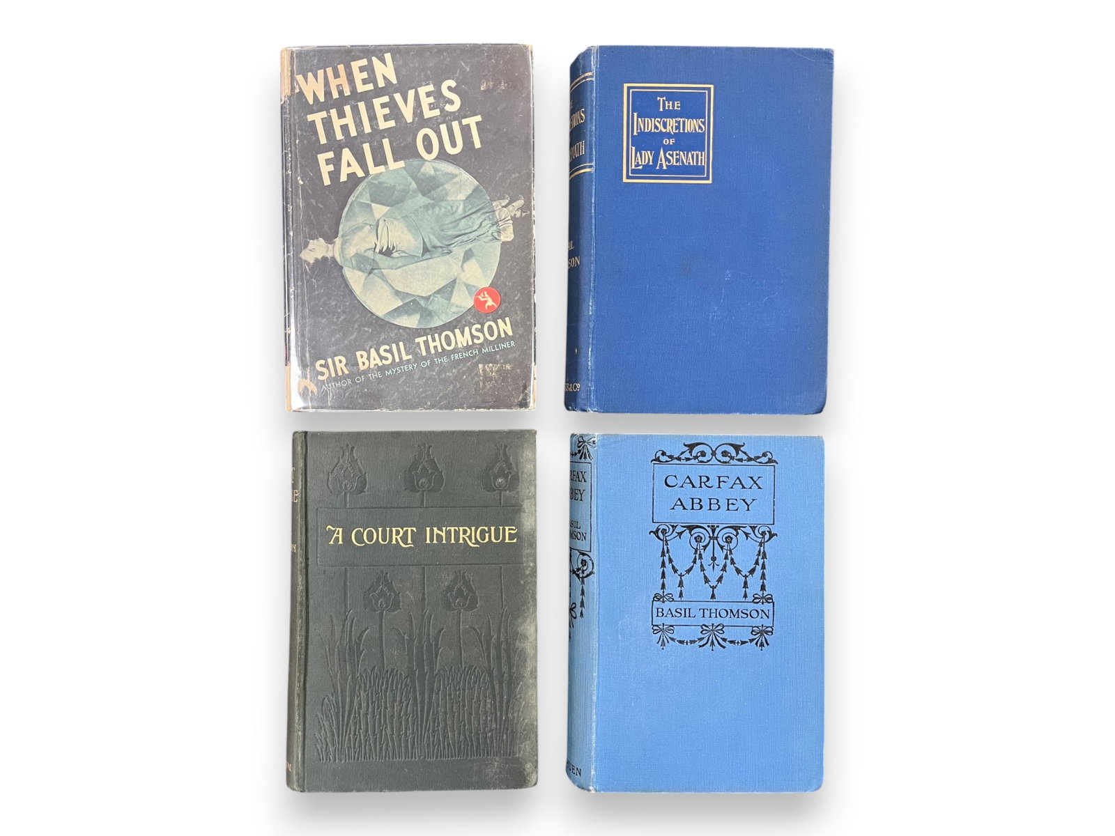(4) Basil Thomson First Editions: Four first editions by Basil Thomson including When Thieves Fall Out and Carfax Abbey. From the Otto Penzler Collection Shipping: Weiss Auctions offers full-service, in-house shipping for nearly all