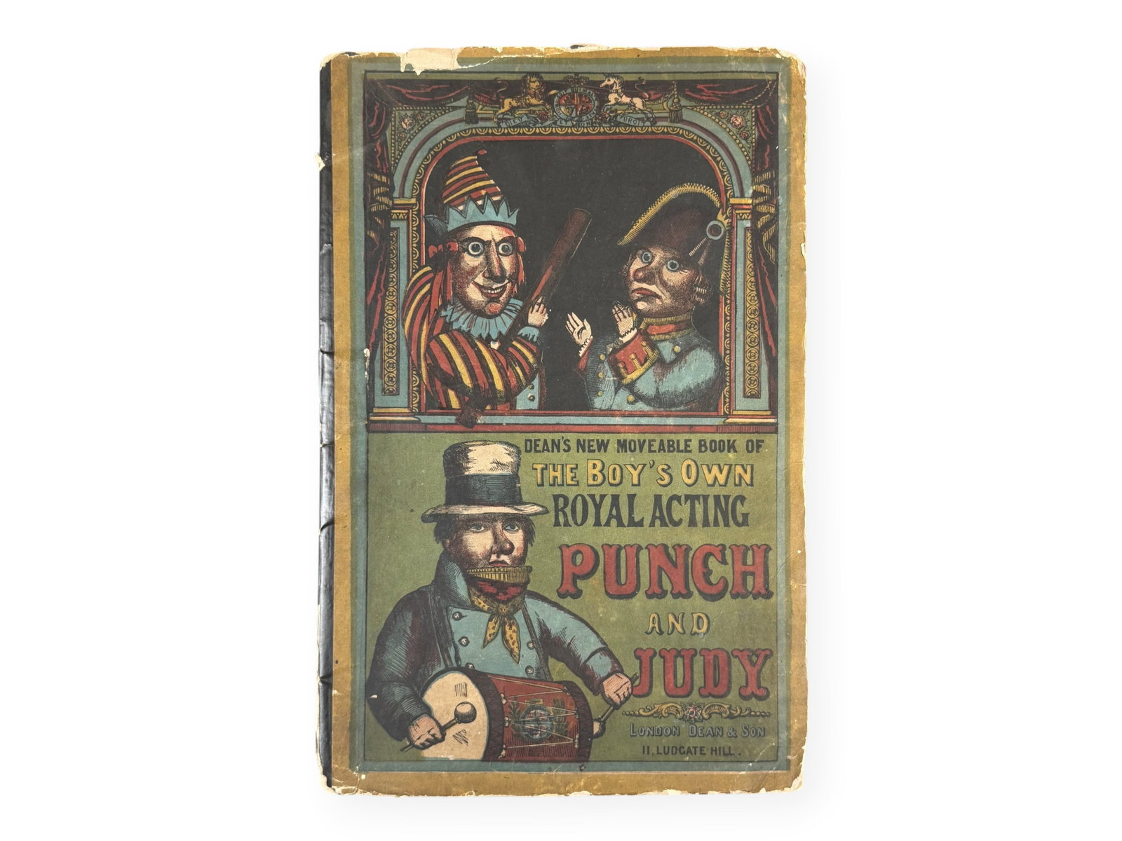 Dean's Punch & Judy Movable Book, 1861: Dean's New Moveable Book of The Boy's Own Royal Acting Punch and Judy. London: Dean & Son, 1861. Folio in publisher's pictorial colored boards with black cloth spine. Eight movable plates, complete.