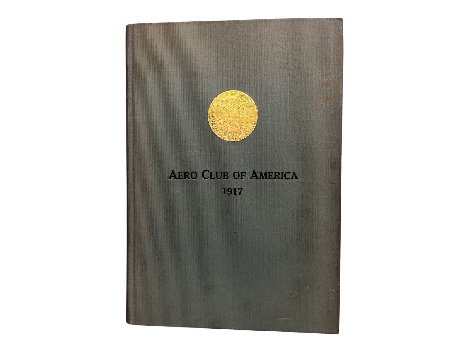 Aero Club of America 1917: Aero Club of America, 1917, published in New York. Bound in original boards. Very fine copy. A scarce item. Shipping: Weiss Auctions offers full-service, in-house shipping for nearly all items in
