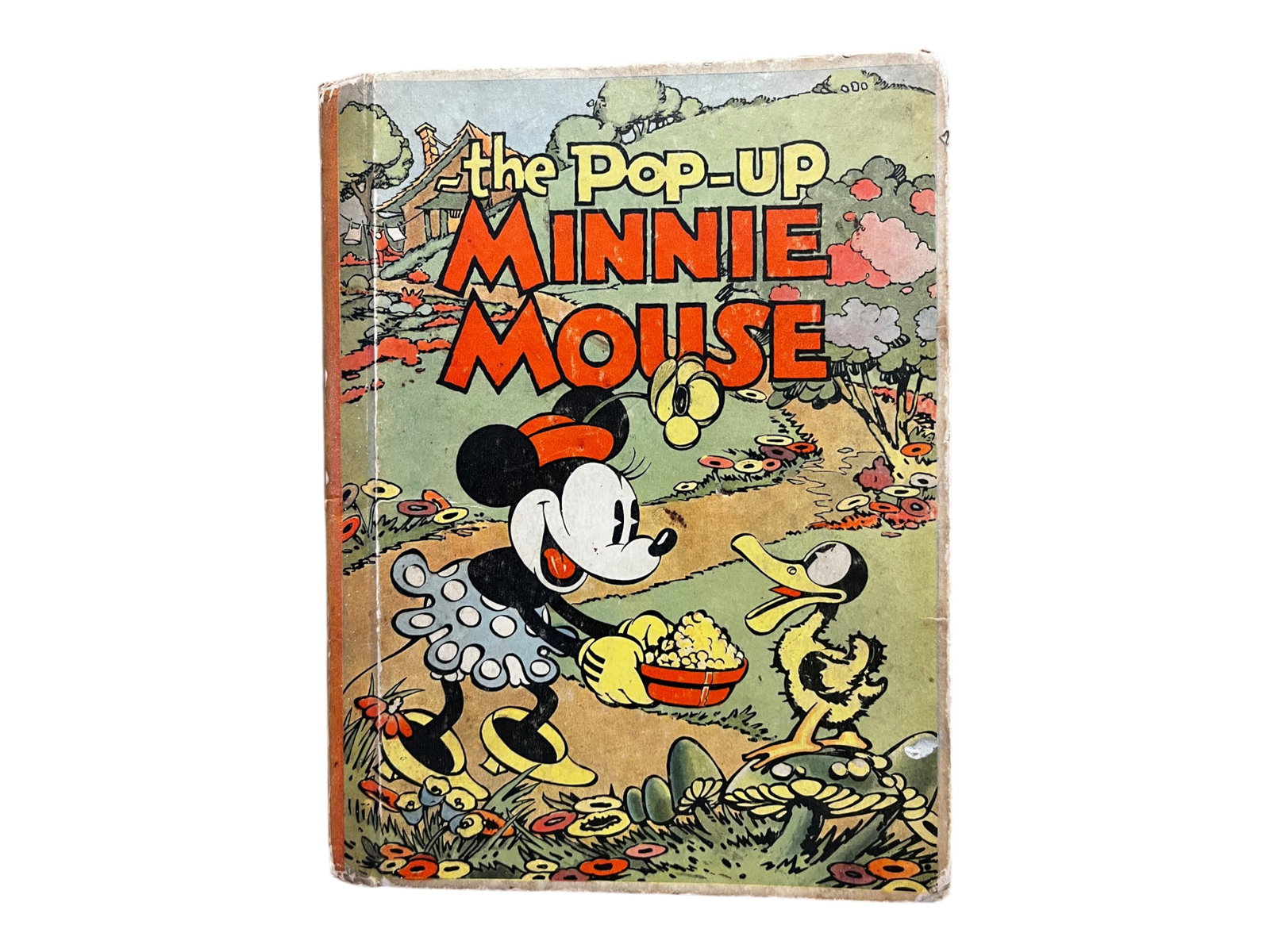 Pop-Up Minnie Mouse 1933: Pop-Up Minnie Mouse, Blue Ribbon Publishing, New York, 1933. Pictorial decorated boards. Contains three pop-ups, all in perfect working condition. Overall clean with wear to bottom of spine and