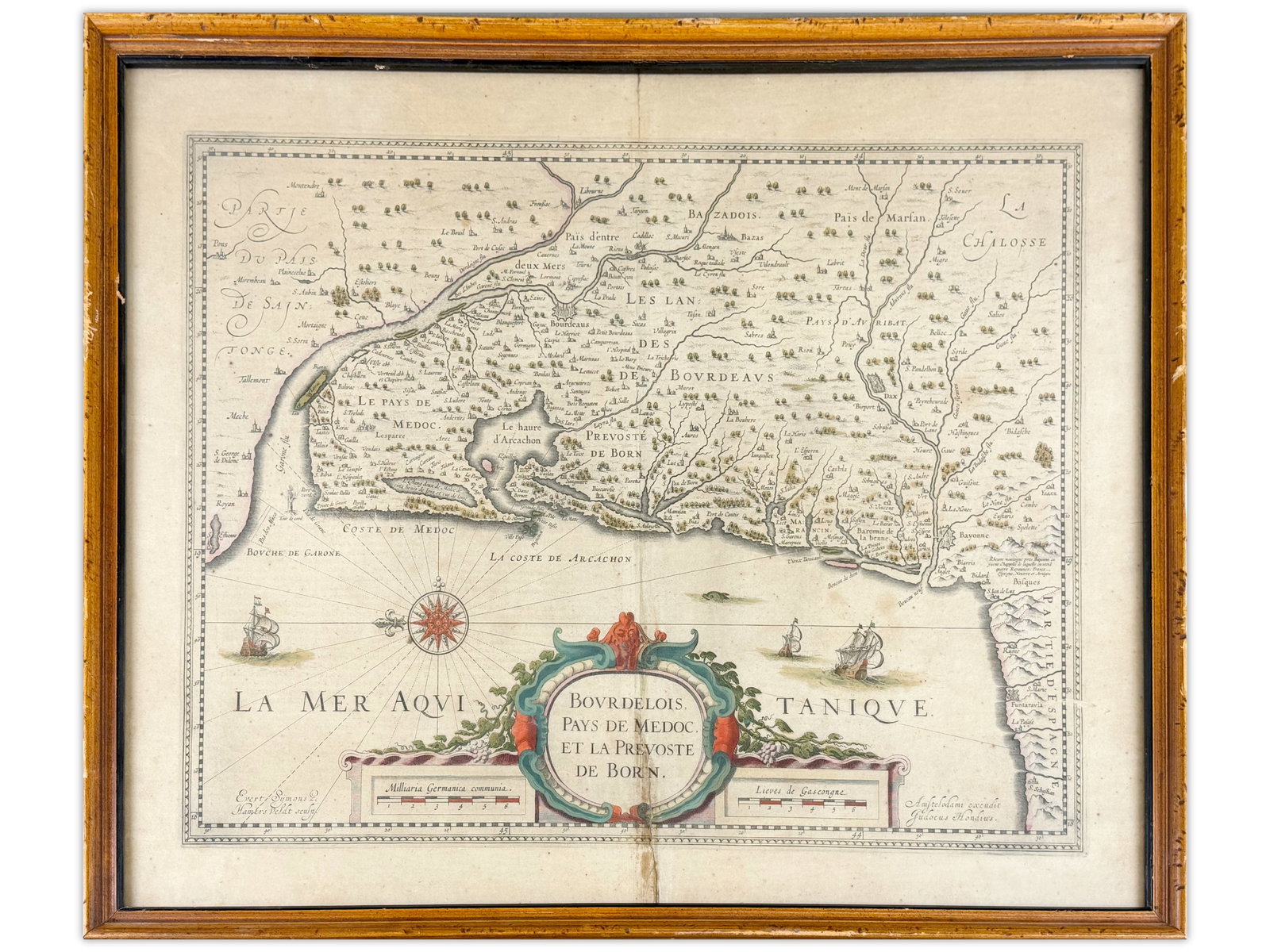 Bourdelois Medoc Colored Map Hondius: Engraved and colored map titled "Bourdelois, Pays de Medoc et la Prevoste de Born," depicting the Atlantic coast of France. By Jodocus Hondius. Framed. Approx. 19" x 24". Shipping: Weiss Auctions