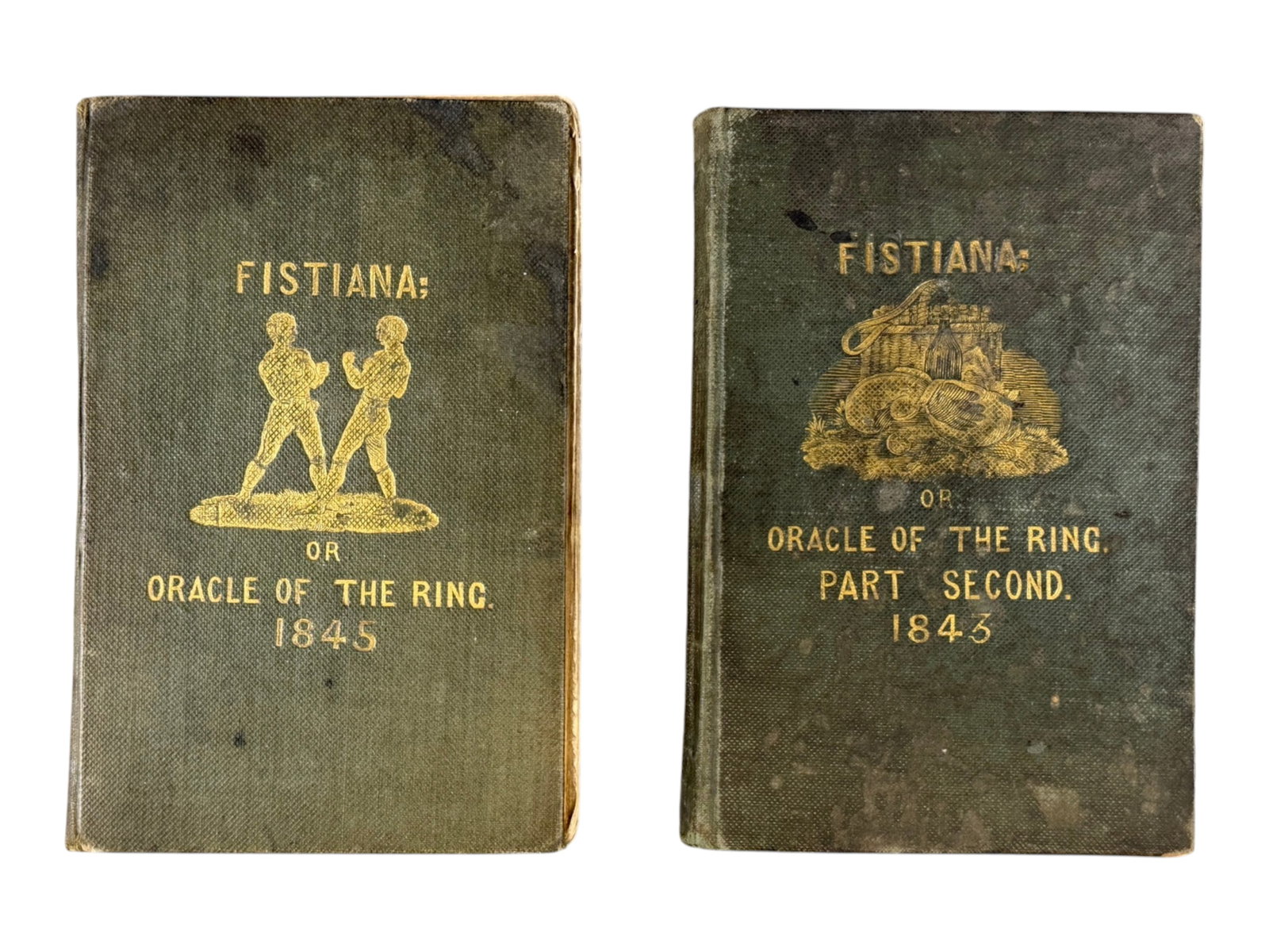 (2) Fistiana Boxing Volumes (1843 & 1845): Fistiana, or Oracle of the Ring. London, 1843 (second edition) and London, 1845 (fifth edition). Small octavo volumes in original cloth with gilt decoration. From the lifetime boxing collection of Pau