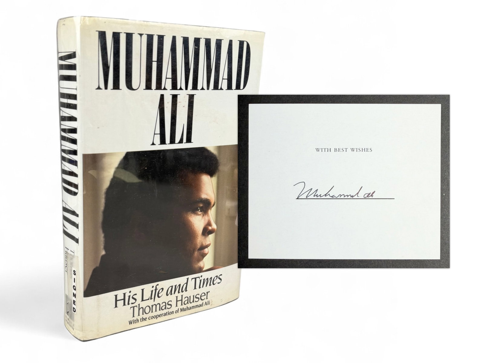Muhammad Ali - His Life and Times (Signed): Muhammad Ali. His Life and Times. Thomas Hauser. New York, 1991. Lacks front free endpaper. Tipped-in bookplate signed by Muhammad Ali with "Best Wishes" printed above. In dust jacket. No certificate 