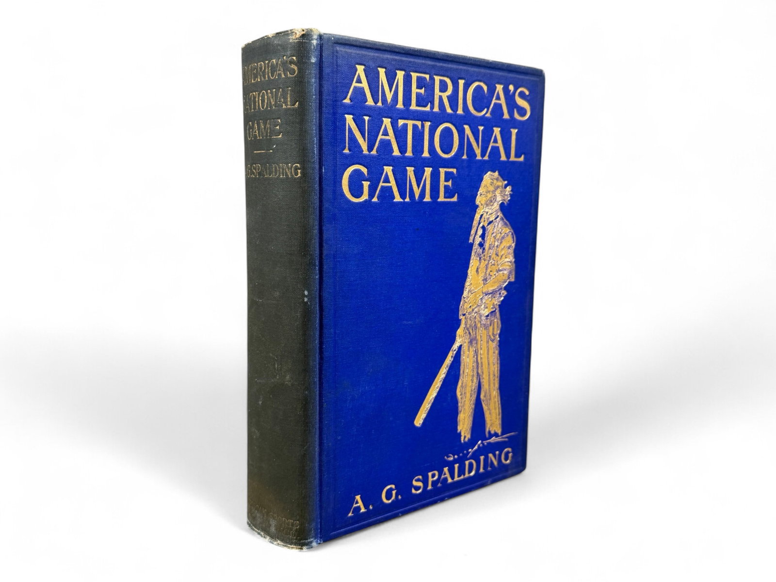 A.G. Spalding - America's National Game (1911): A.G. Spalding. America's National Game. First edition. New York, 1911. Octavo format. Gilt-decorated cover depicting Uncle Sam holding a baseball bat. Spine wear with cracked rear hinge. From the life