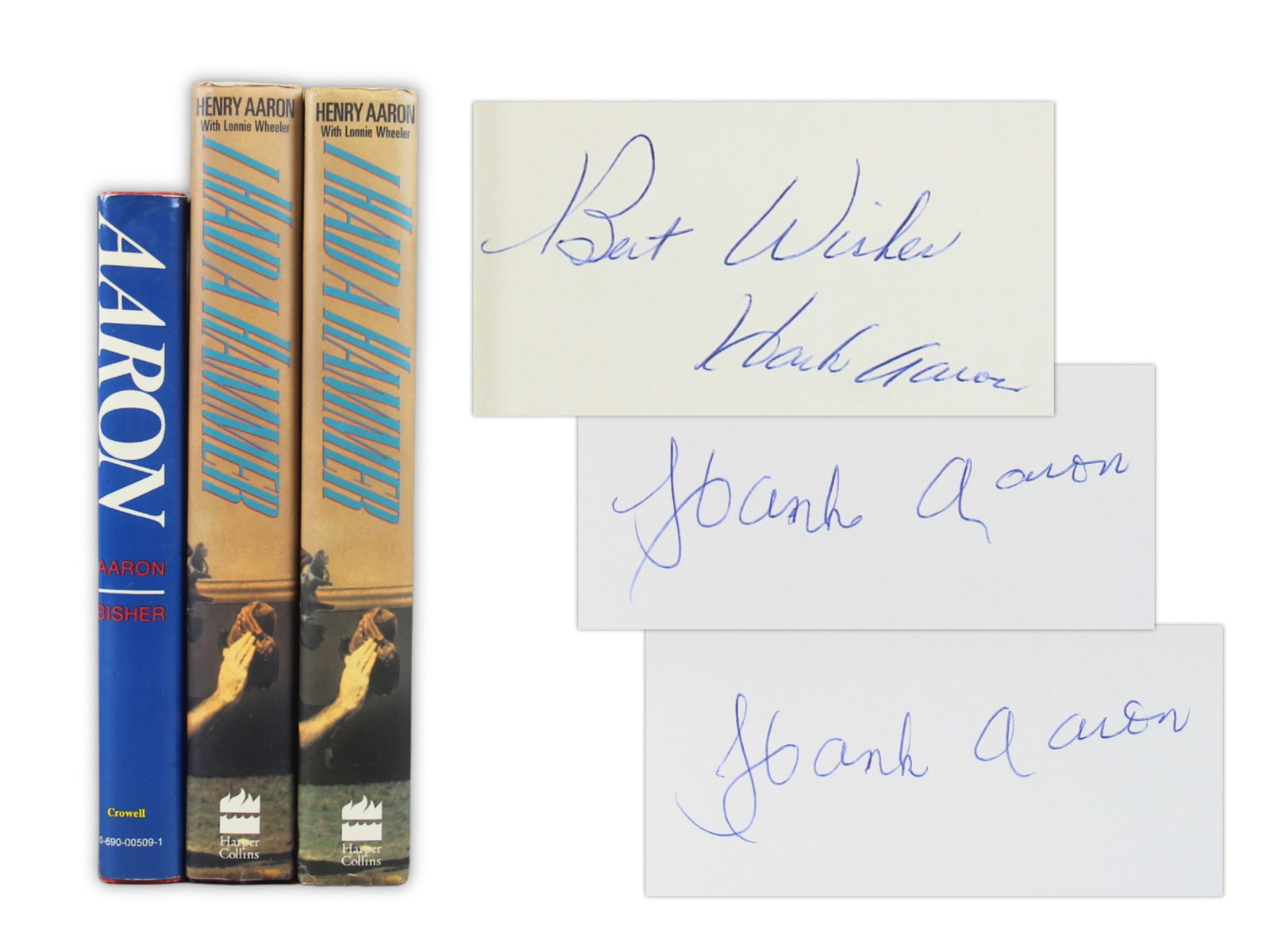 (3) Signed Hank Aaron Books: Lot of three signed Hank Aaron hardcover books with dust jackets. Includes Aaron: The Autobiography (1974), signed on front free endpaper. Also two copies of I Had a Hammer (1991), one signed on half-