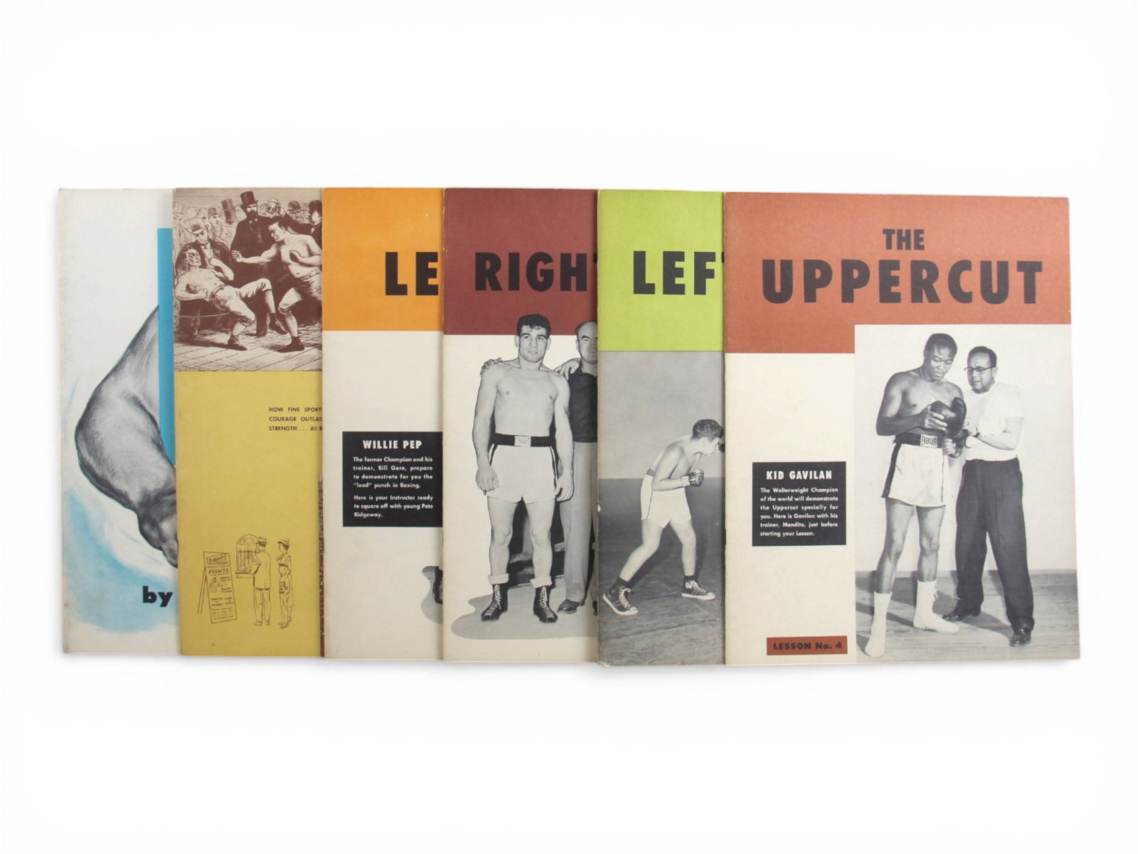 (6) 1950's Boxing Instructional Training Guides: Oversized boxing instructional guides. Titles include "The Saga of Boxing," "How to Defend Yourself - Opening Chapter," "The Left Jab - Lesson No. 1" featuring Willie Pep, "The Right Cross - Lesson No