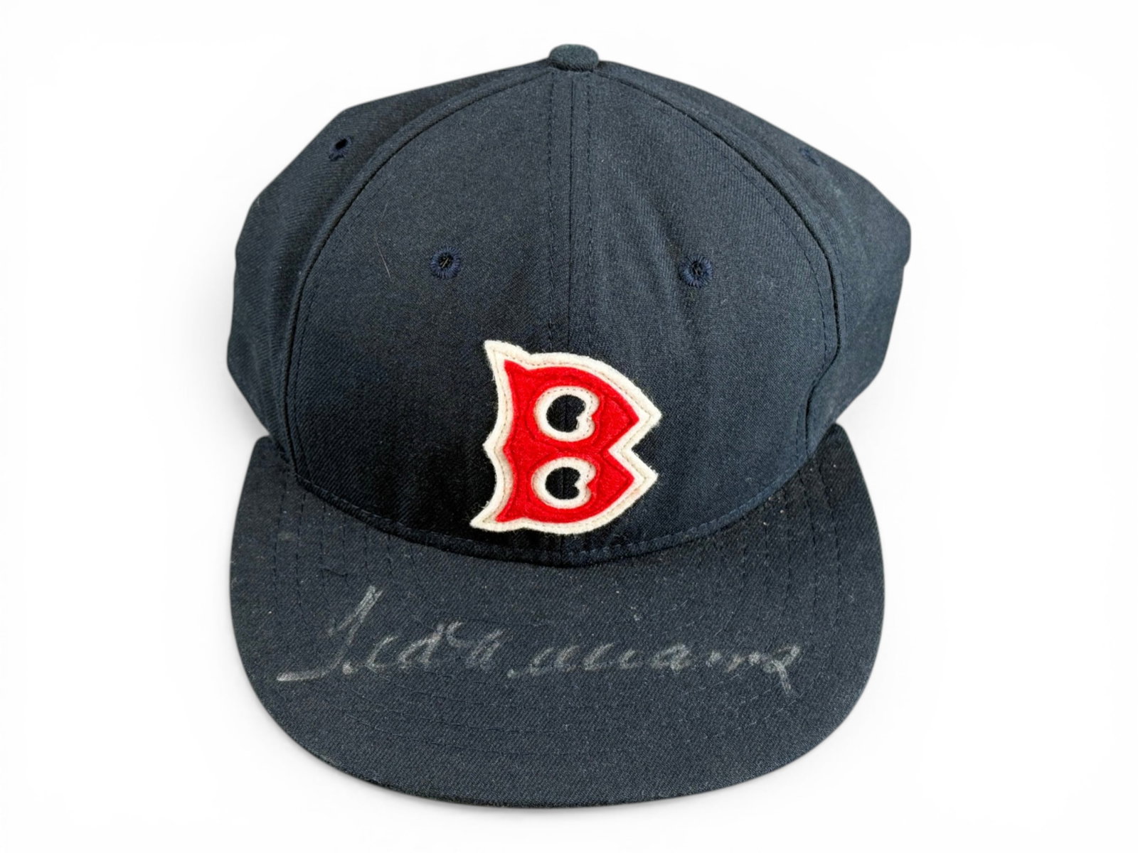 Ted Williams Signed Red Sox Hat - JSA: Boston Red Sox Cooperstown Collection cap signed by Ted Williams across the brim in silver paint pen. Williams remains one of the greatest hitters in baseball history, finishing his career with a .344