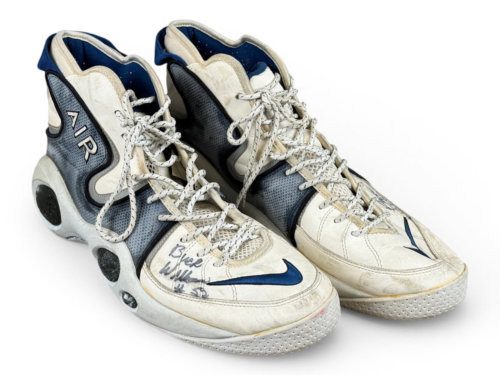 Buck Williams Game Worn Signed Nike Flight 95: Pair of Nike Air Zoom Flight 95 basketball sneakers game worn by Buck Williams of the Portland Trail Blazers, dating to the mid-1990s. The design features the distinctive "bug-eye" midsole pods and bo