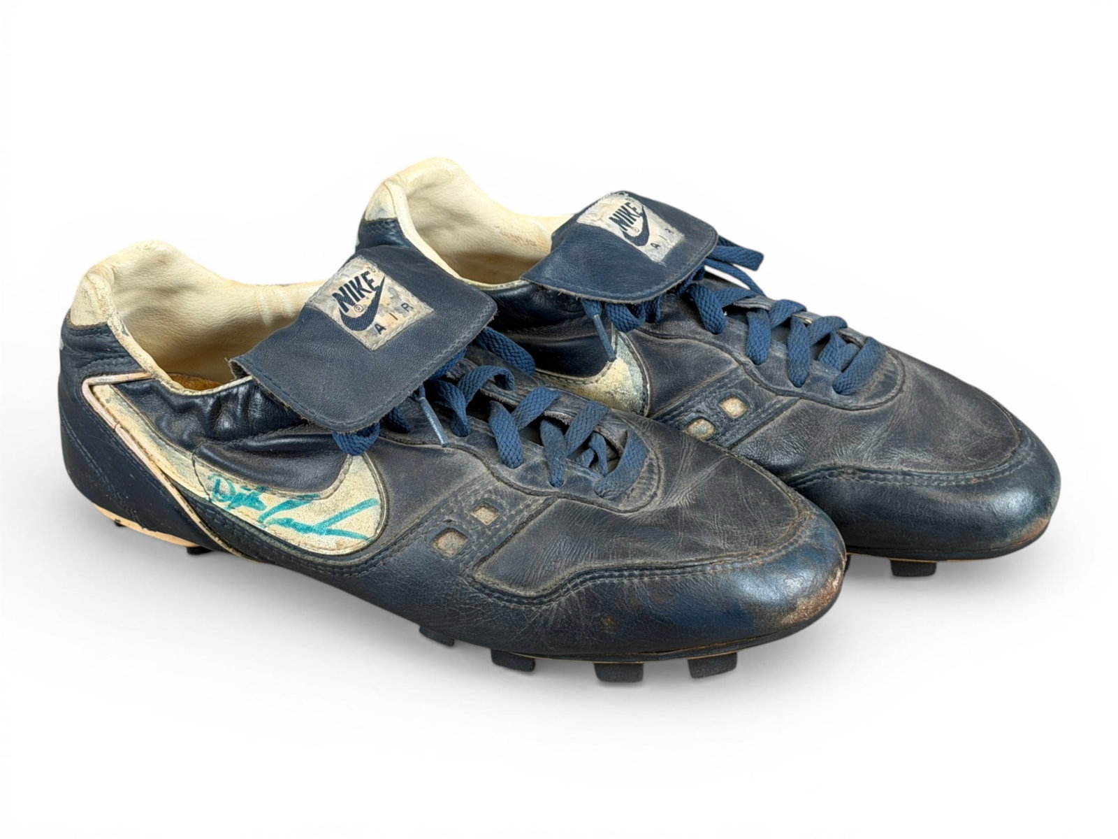 Dwight Gooden Game Worn Signed Mets Cleats: Pair of New York Mets cleats game worn by Dwight Gooden during the 1980s. Both cleats signed on the Nike swoosh in blue marker. Size 11. Heavy wear from game use. Gooden won the 1984 NL Rookie of the 