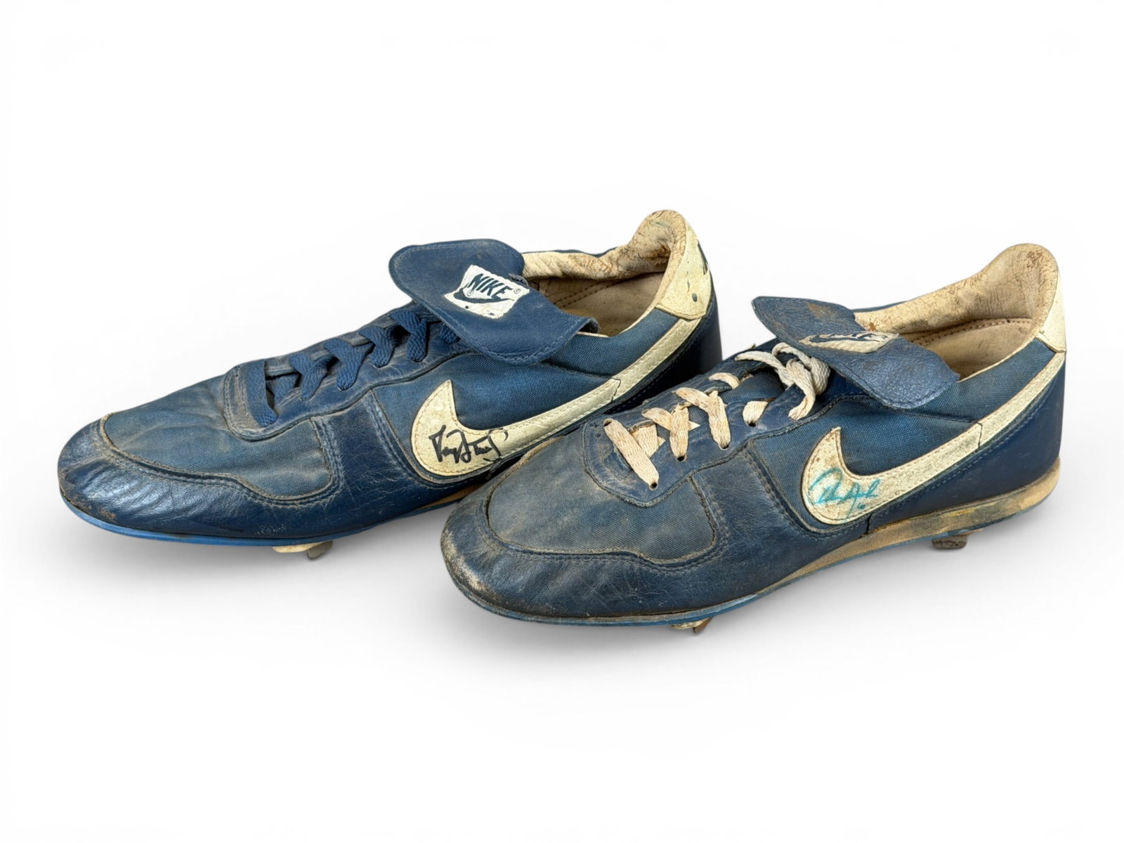 (2) Mets Game Worn Cleats Strawberry/Johnson: Two 1980s New York Mets game worn cleats, both left shoes. Includes Darryl Strawberry cleat size 11.5 signed in black marker with number 18 on heel. Also Howard Johnson cleat size 9 signed in blue ink