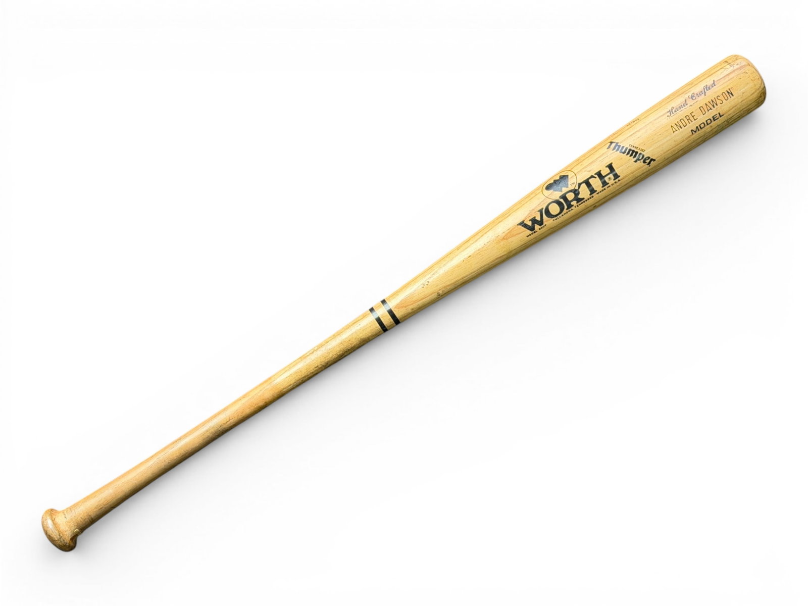 Andre Dawson Game Used Signed Worth Bat: Worth Tennessee Thumper baseball bat game used by Andre Dawson and signed "To Melvin Best Wishes Andre Dawson." Knob marked 8 W225 and stamped AD 4 1/2 W225 with end marked W225. Dawson recorded 438 c