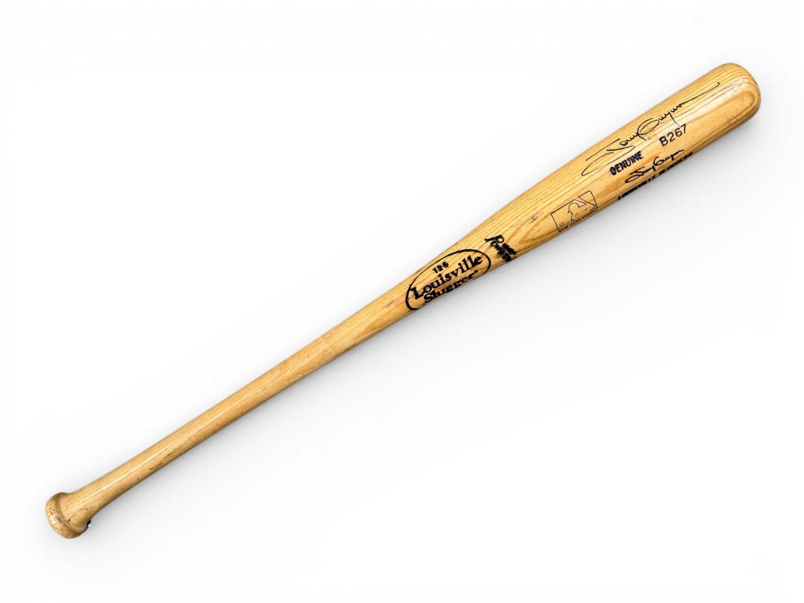 Tony Gwynn Game Used Signed Louisville Bat: Louisville Slugger B267 model bat game used by Tony Gwynn and signed in bold black marker. Knob marked B267C B3 - 30.5 19 with end marked B267 19. Light wear. Gwynn was an 8-time NL batting champion a