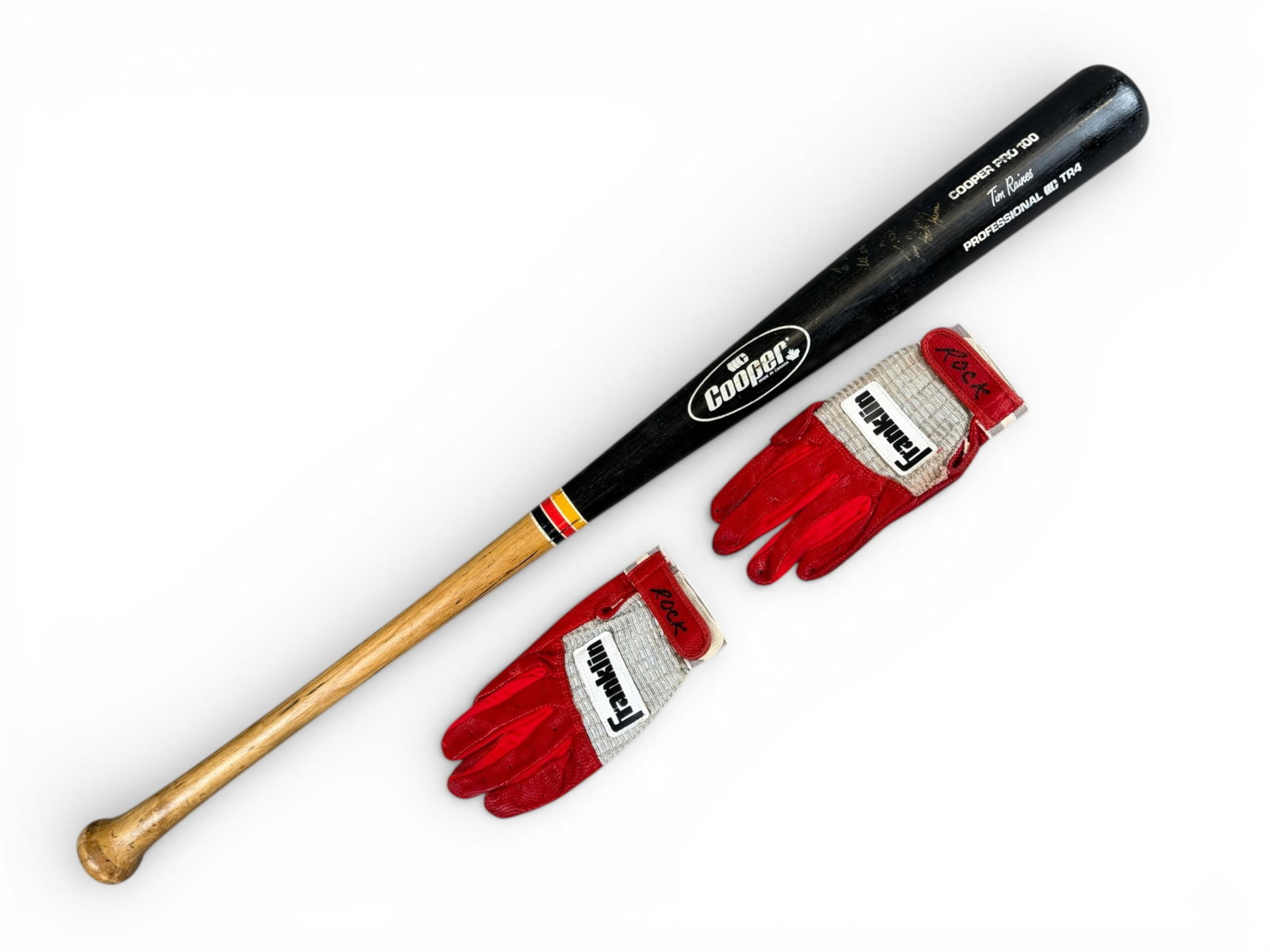 Tim Raines Game Used Signed Bat & Batting Gloves: Cooper Pro 100 Professional TR4 model bat game used by Tim "Rock" Raines and signed "To Melvin, All the Best #30 Tim "Rock' Raines." Knob marked 30. Includes pair of red game worn Franklin batting glo