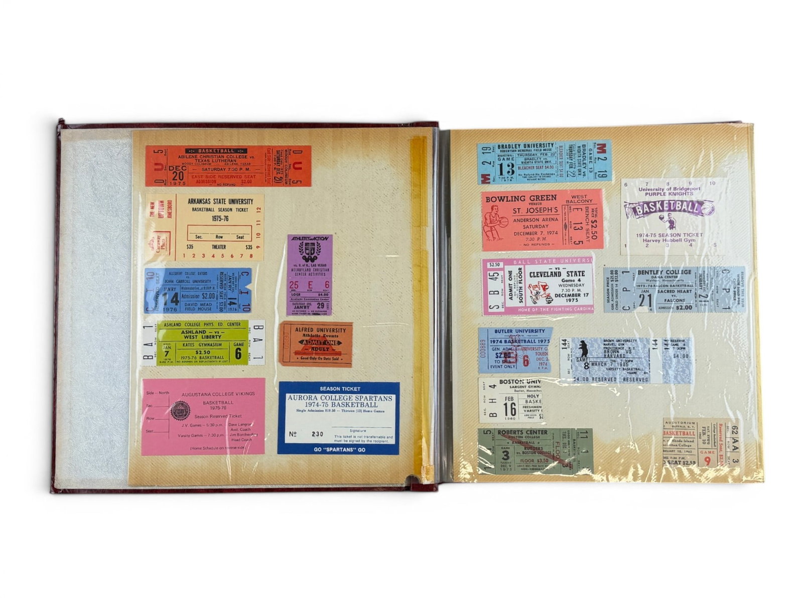 1970s College Basketball Ticket Scrapbook: Scrapbook containing approximately 200 college basketball tickets and passes spanning a wide range of programs, primarily from the 1970s with a few earlier examples. The collection includes both full