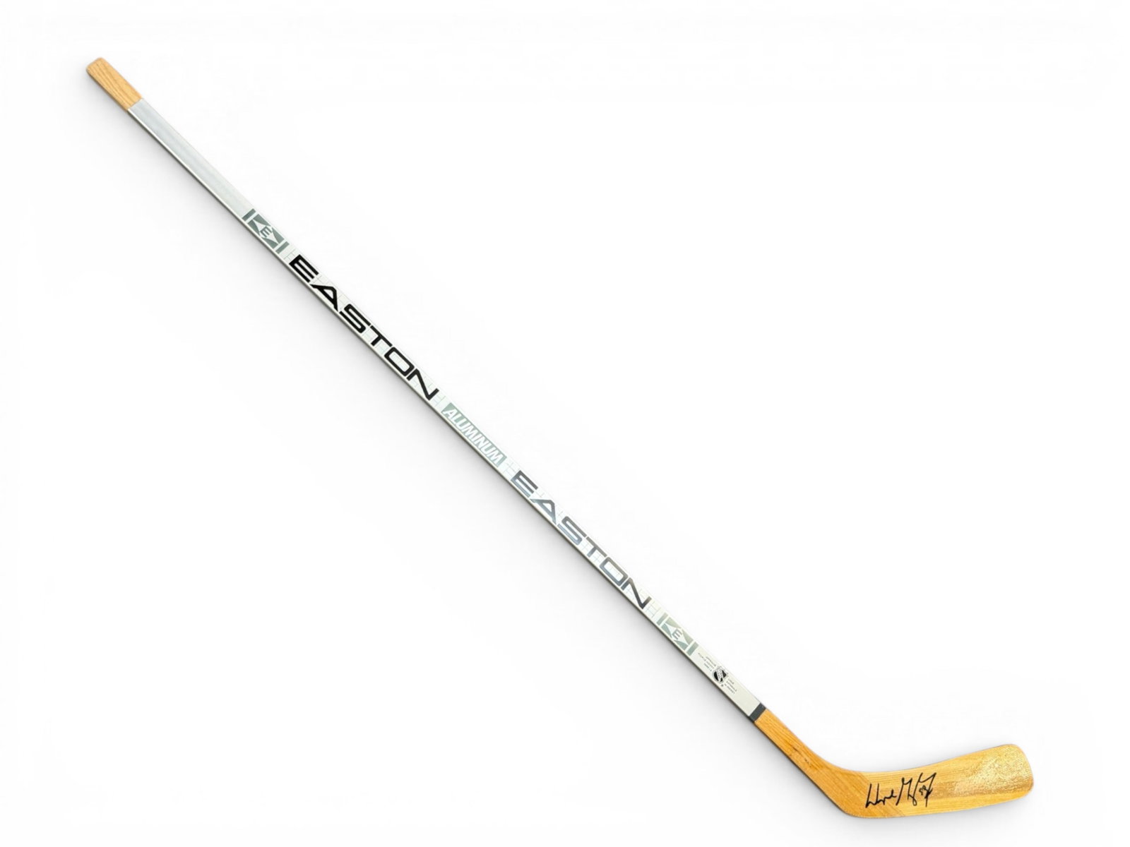 Wayne Gretzky Signed Easton Hockey Stick: Official left-handed Easton aluminum NHL hockey stick, Wayne Gretzky Signature Model silver HXP 5100, signed on the blade in black marker by Wayne Gretzky, who adds "99." Gretzky, widely regarded as