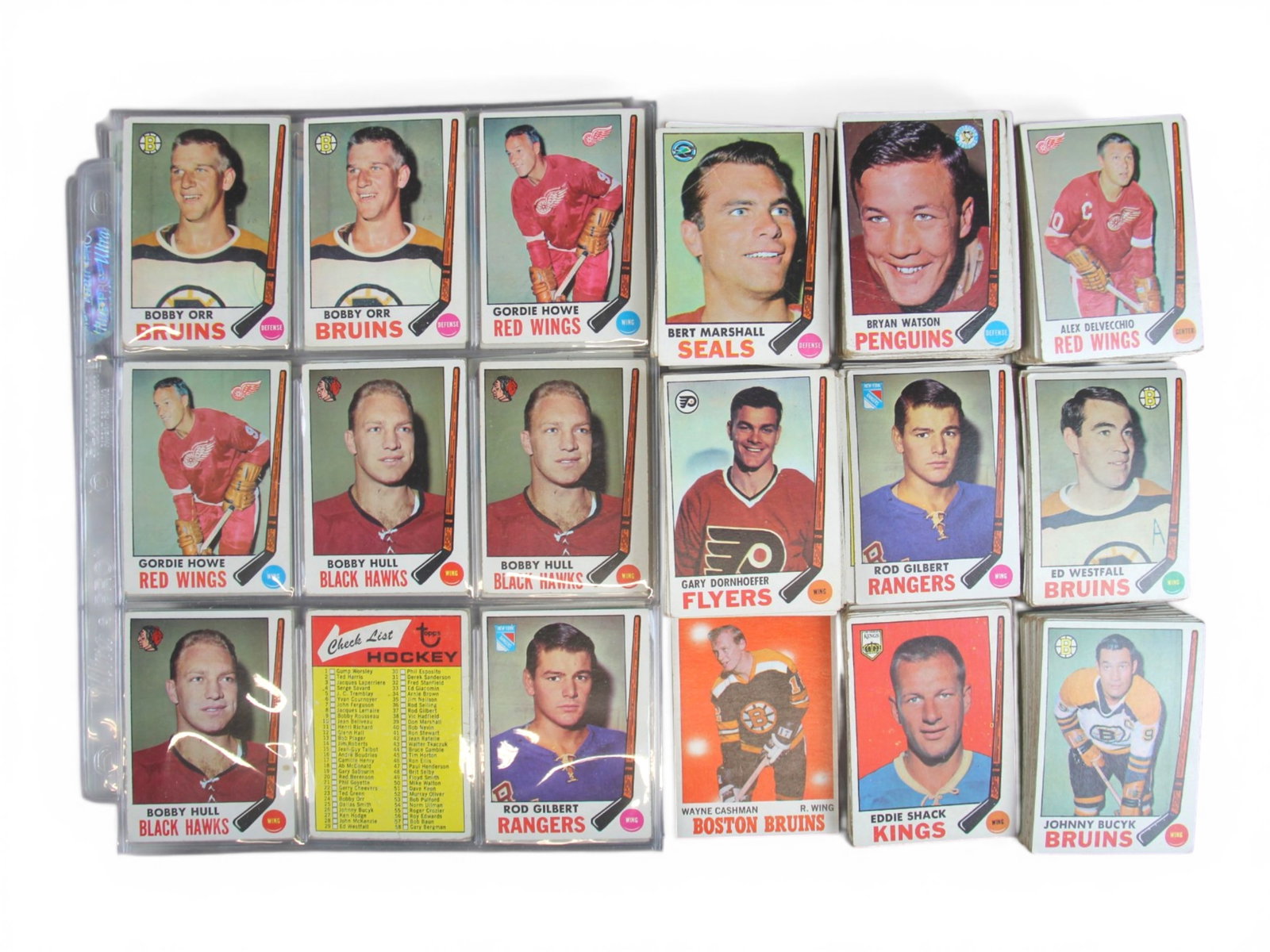 1969-72 Topps Hockey Card Collection (100+): 1969-1972 hockey card collection of more than 100 cards including stars and Hall of Famers such as Bobby Orr, Gordie Howe, Bobby Hull, Ken Dryden, and others. A sampling is shown, with the majority of