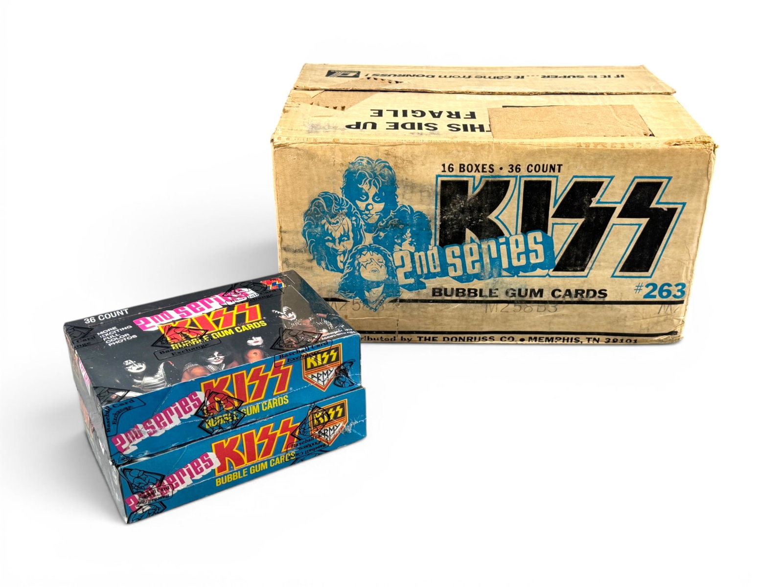 1978 Donruss Kiss 2nd Series Complete Case: Complete case of 1978 Donruss "KISS - 2nd Series" wax packs containing 16 unopened boxes, all sealed and authenticated by BBCE. The lot also includes the original Donruss shipping case housing the 16 