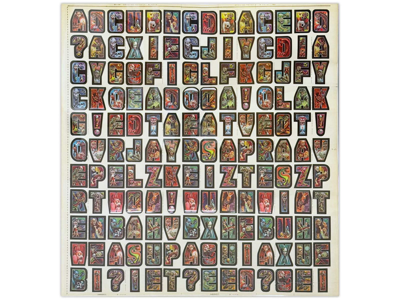 1967 Topps Nutty Initials Stickers Uncut Sheet: Vintage uncut sheet of 1967 Topps Nutty Initials Stickers. There are 154 stickers in total on the sheet. There are a few that have begun to peel off the paper. Sheet size is approx. 26" x 28-1/2". Shi