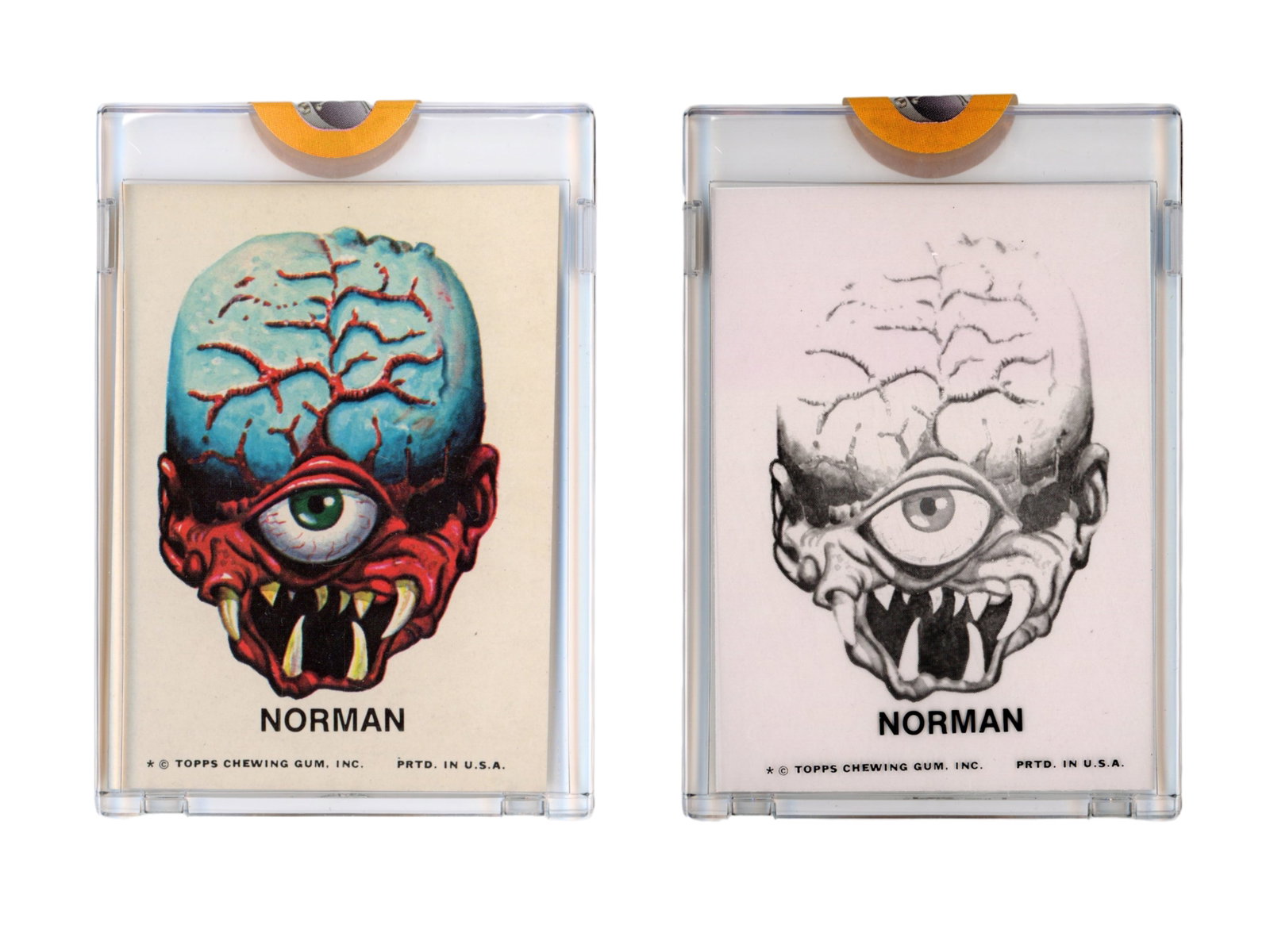 (2) 1973 Topps Ugly Stickers Film Positives: Group of (2) 1973 Topps Ugly Stickers 4-color film positives featuring Norman, from the Topps Vault. These represent pre-production printing material used in the creation of the issued stickers and ar