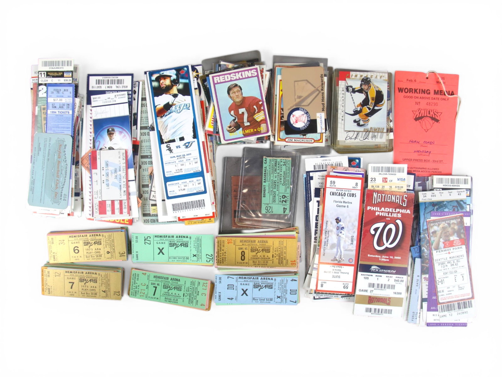 Large Ticket and Card Group: Approximately 400 pieces including more than 250 San Antonio Spurs playoff tickets along with signed sports cards, fabric cards, and game-used cards. Basketball, football, and hockey represented.