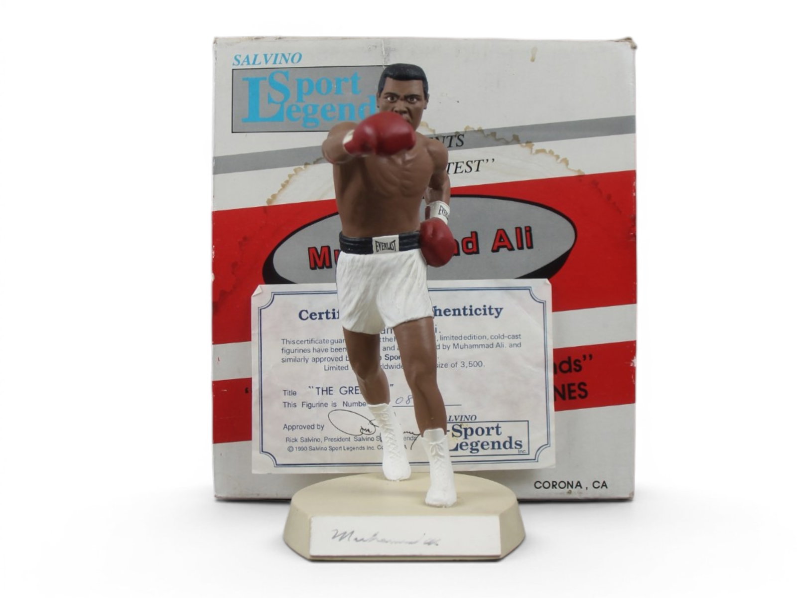 Muhammad Ali Signed Salvino Figurine: Hand-signed limited edition porcelain Salvino figurine of Muhammad Ali throwing a jab, titled The Greatest, numbered #818/3500. Accompanied by the original box, which shows wear and water staining, al