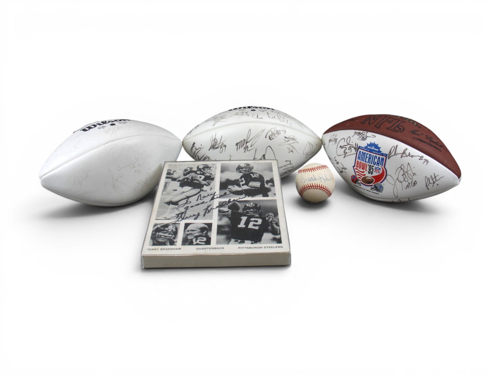 (5) Signed Sports Memorabilia Group: Group lot including a signed 1995 Pro Bowl football, a 1995 Bills vs. Cowboys American Bowl signed football, a 1994 New York Jets team-signed ball on an NFL 75th Season football featuring Boomer Esias