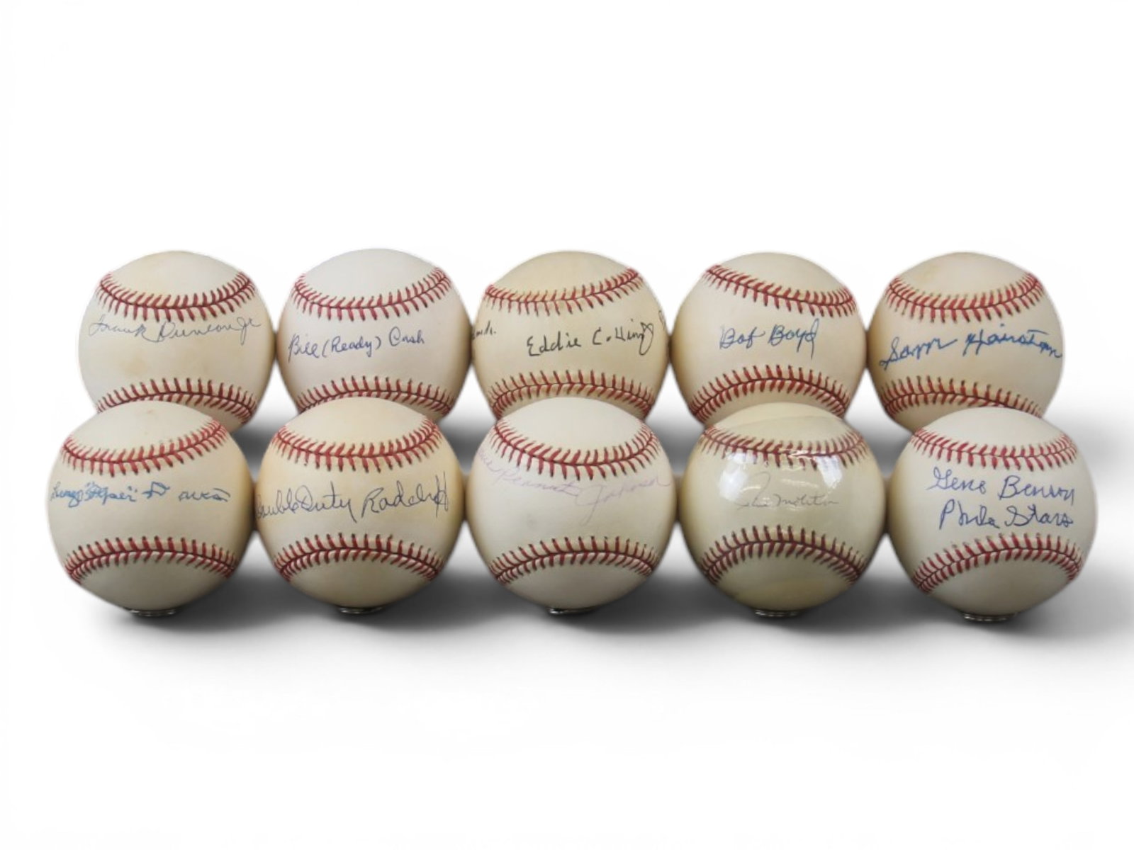 (10) Signed Baseballs including Negro League Stars: Group of (10) signed baseballs including signatures from notable Negro League players such as Ted 'Double Duty' Radcliffe, Mamie 'Peanut' Johnson, Bill Ready Cash, and others. Also includes a signed b