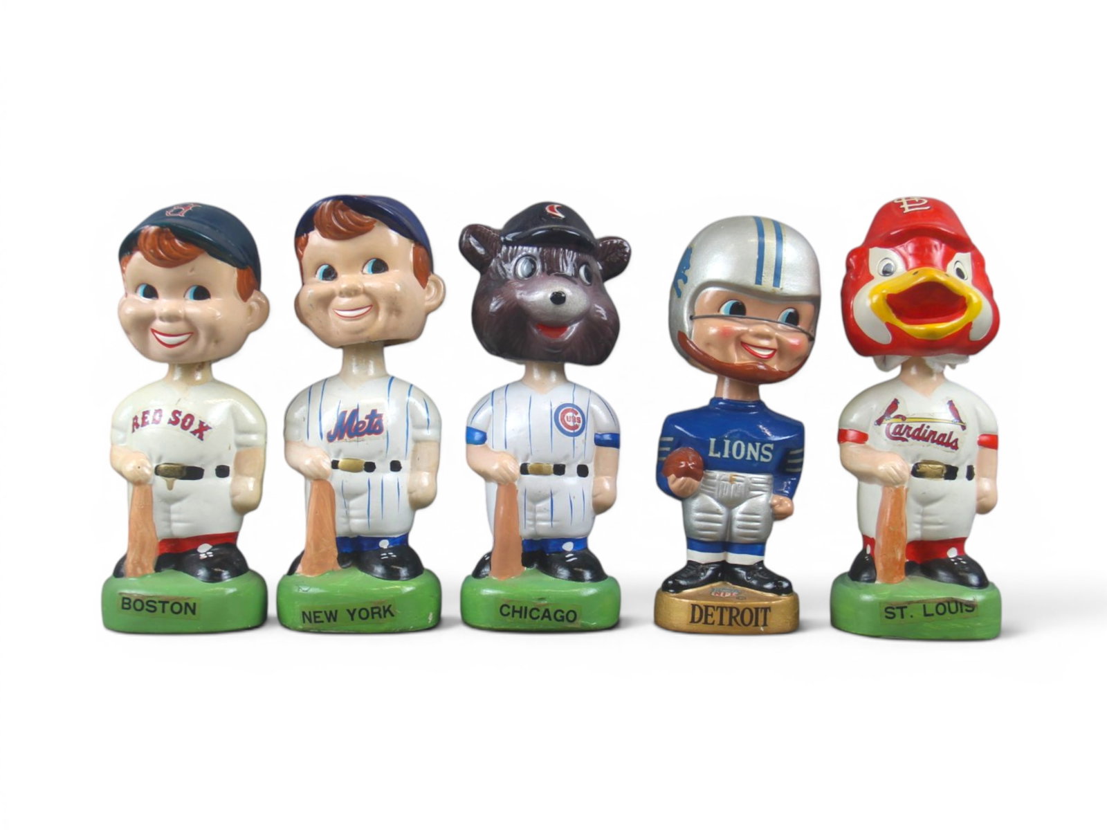 (5) Sports Nodders, Baseball and Football: Includes Detroit Lions, and (4) modern baseball Nodders including New York Mets, Boston Red Sox, St. Louis Cardinals, and Chicago Cubs. Each shows some surface wear, paint scuffs, scratches, etc. Some