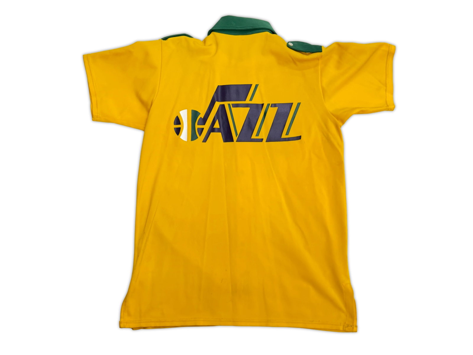 1980-81 Utah Jazz NBA 35th Anniv Shooting Shirt: Tagged "Medalist Sand Knit", Size 46, along with another tag "18". This shirt can be dated to 1980-81 primarily because of the decorative 35th Anniversary patch. Shipping: Weiss Auctions offers full-s