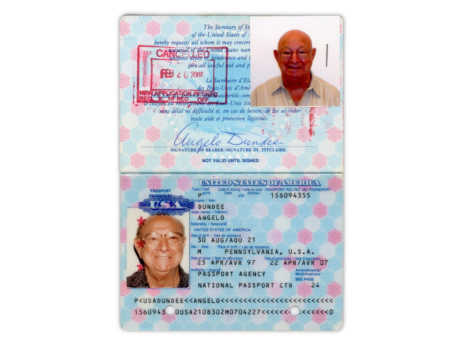 Angelo Dundee Signed U.S. Passport: Signed United States passport issued to Angelo Dundee, cancelled in 2007 and signed in blue pen. The passport contains two photographs of Dundee within. Dundee is best known for training some of