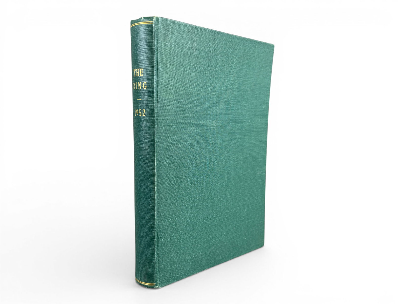 1952 Ring Magazine Bound Volume: Bound volume of The Ring Magazine containing all 1952 issues, nicely housed in a green cover and binding. A solid year of the leading boxing publication, covering the post-war era of the sport. Shippi