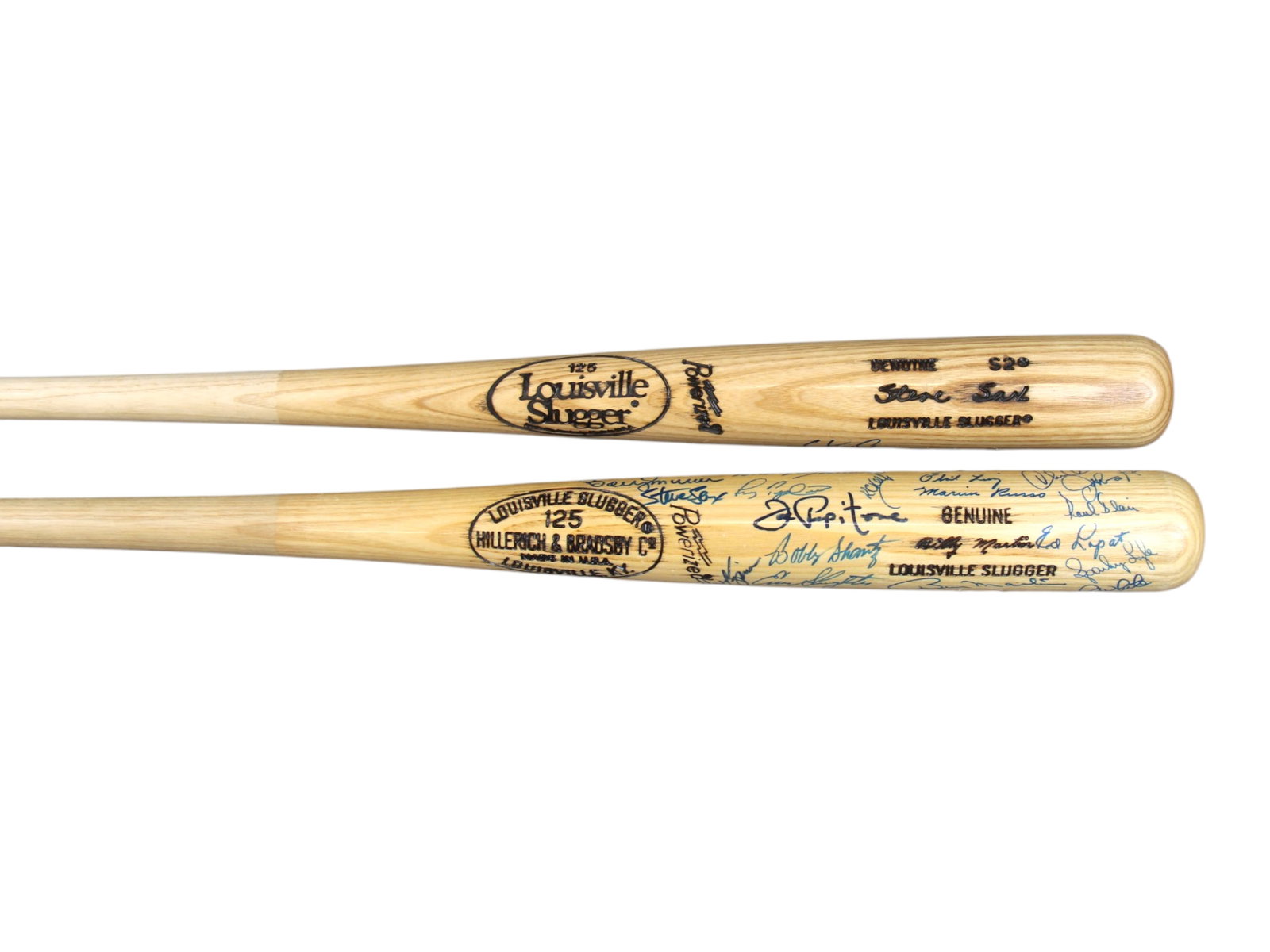 (2) Signed Bats, including Yankees Team Signed Bat: Lot of 2 signed Louisville Slugger bats. One is single signed by Steve Sax, along with the inscription "82 National League Rookie of the Year". The other bat is a New York Yankees team signed bat with