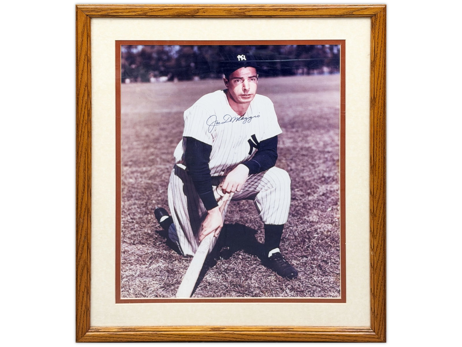 Joe DiMaggio Signed 16x20 Photo: Joe DiMaggio signed 16" x 20" photograph, framed. Features the Hall of Fame Yankees legend and one of the most iconic figures in baseball history. Shipping: Weiss Auctions offers full-service, in-hous