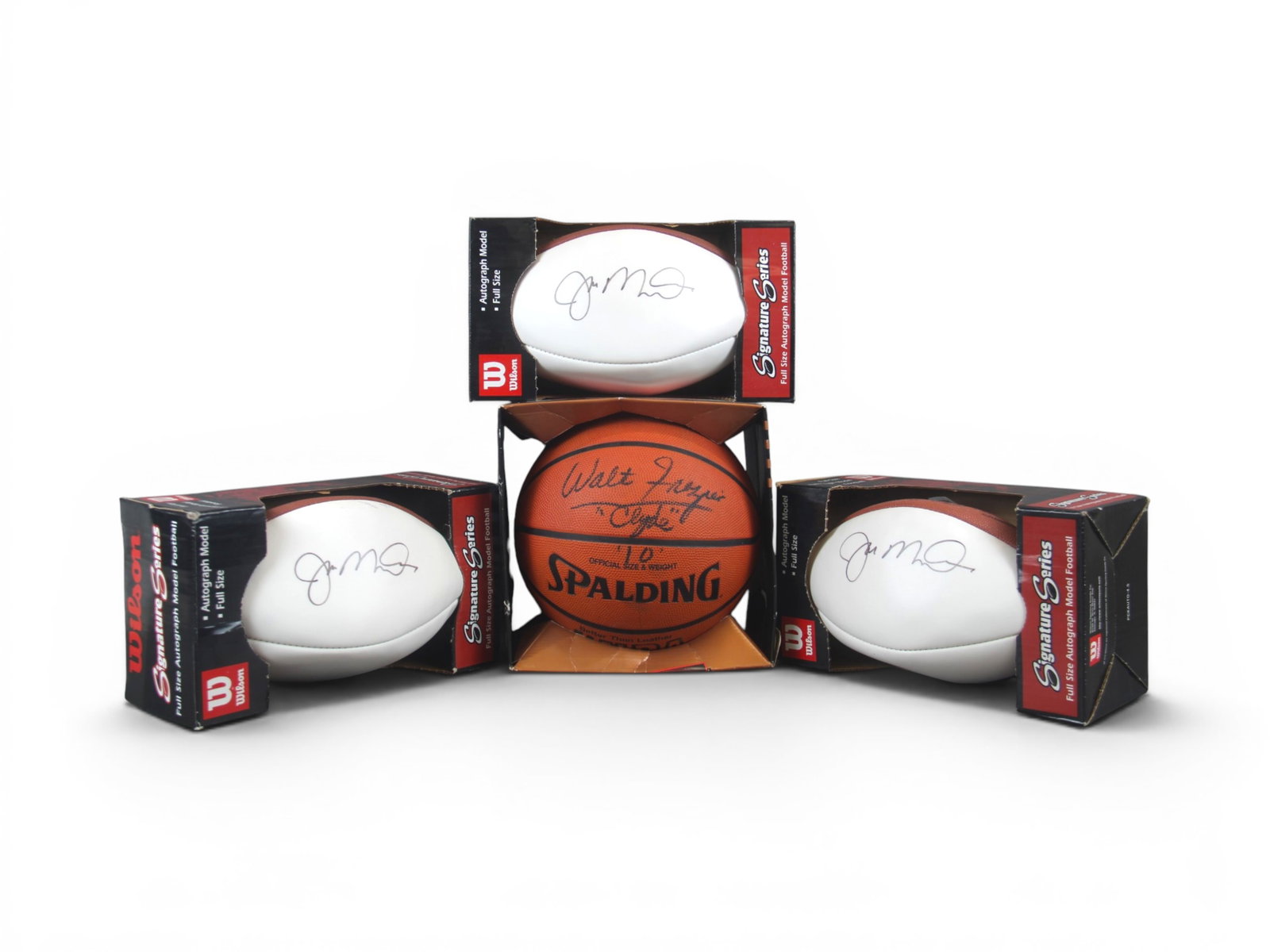 (3) Montana Footballs & Frazier Basketball: Group of (3) signed footballs by Joe Montana together with a signed basketballs by Walt "Clyde" Frazier. A nice pairing of Hall of Fame signatures from two iconic athletes in football and basketball. 