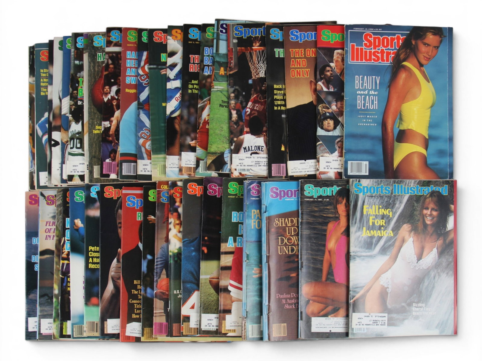 (40) Sports Illustrated Magazine Issues 1982-90: Group of approximately 40 Sports Illustrated magazines dating from 1982-1990. Nice lot with great covers featuring Pete Rose, Howard Cosell, John McEnroe, Wayne Gretzky, Patrick Ewing, Magic Johnson, 