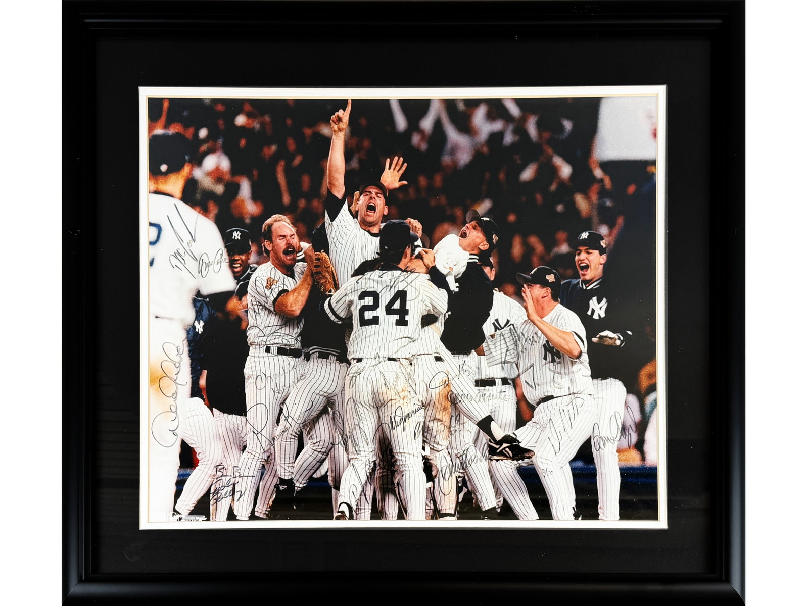 1996 NY Yankees Team Signed Photo: Offered is a 1996 New York Yankees team signed photo, Game 6 celebration. Limited edition 2/50. Features 22 signatures, highlighted by: Mariano Rivera, David Cone, Wade Boggs, Tino Martinez, Cecil Fei