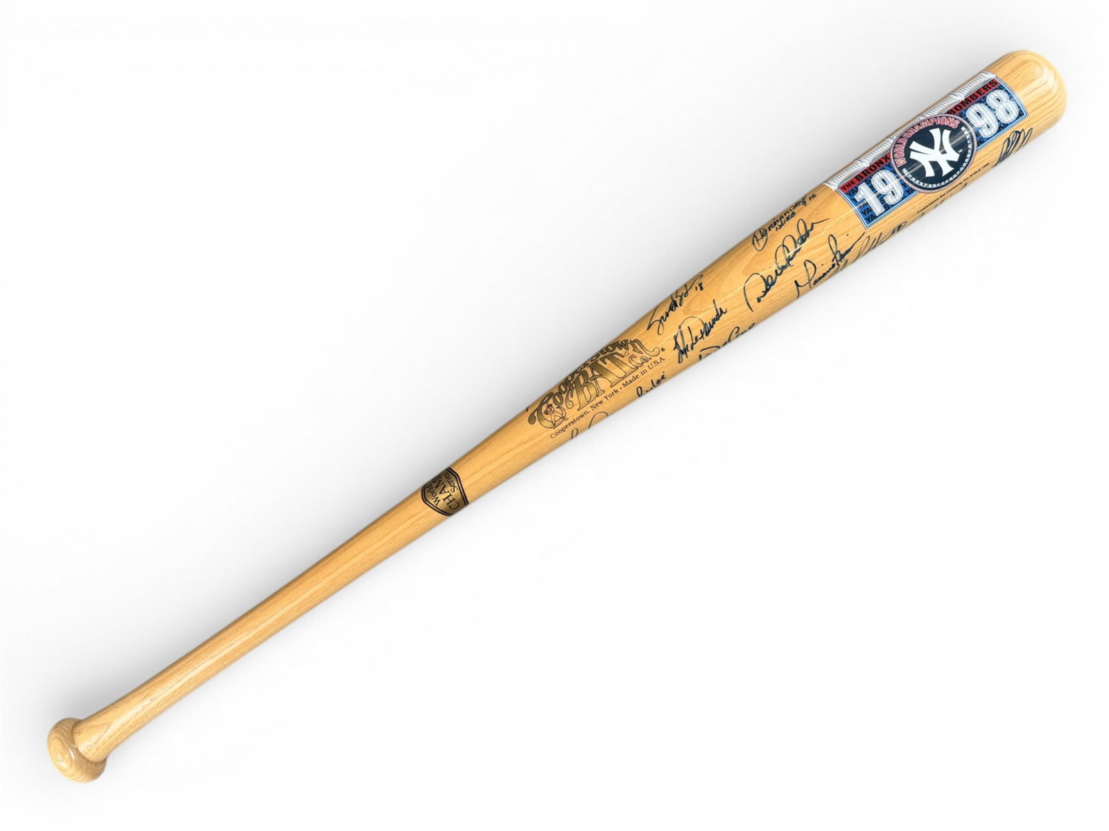 1998 NY Yankees Team Signed Baseball Bat: Offered is a World Series Cooperstown Bat, featuring approx. 24 signatures including: Derek Jeter, David Cone, Mariano Rivera, Andy Pettitte, Shane Spencer, Joe Giradi, Paul O'Neill, Willie Randolph, 